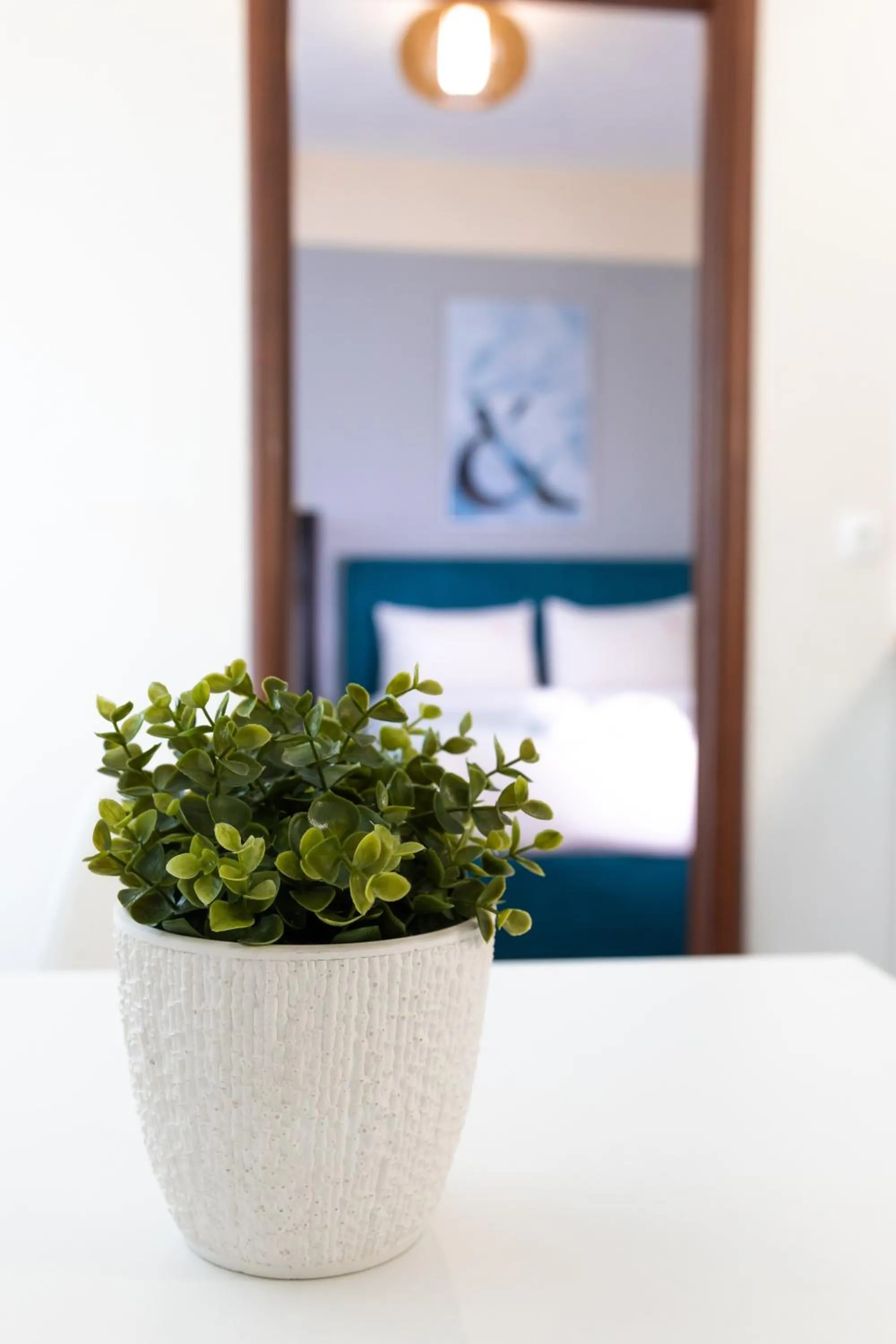 Bed in City Plaza Apartments & Rooms