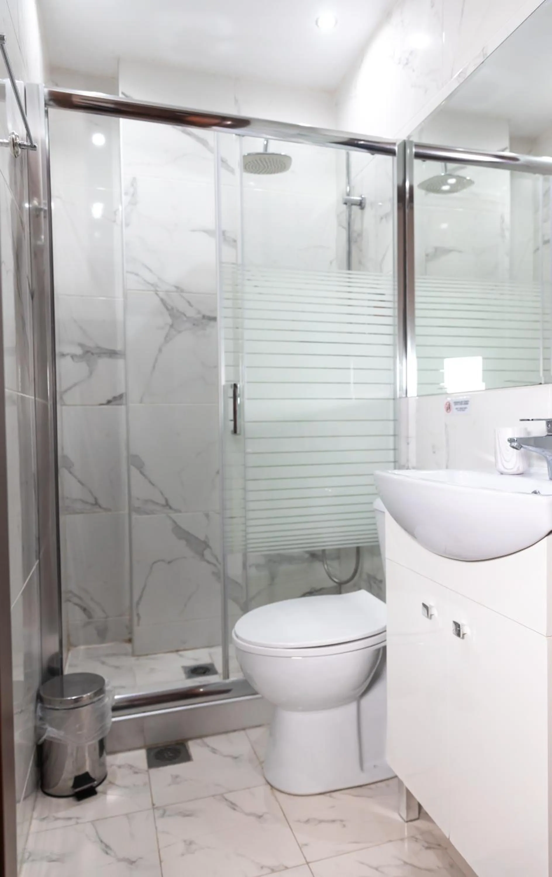 Shower in City Plaza Apartments & Rooms