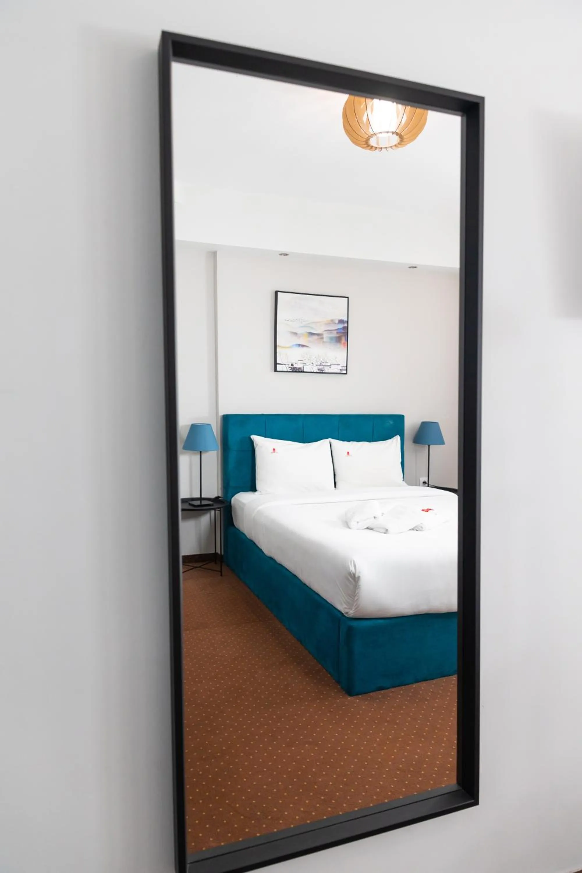 Bed in City Plaza Apartments & Rooms