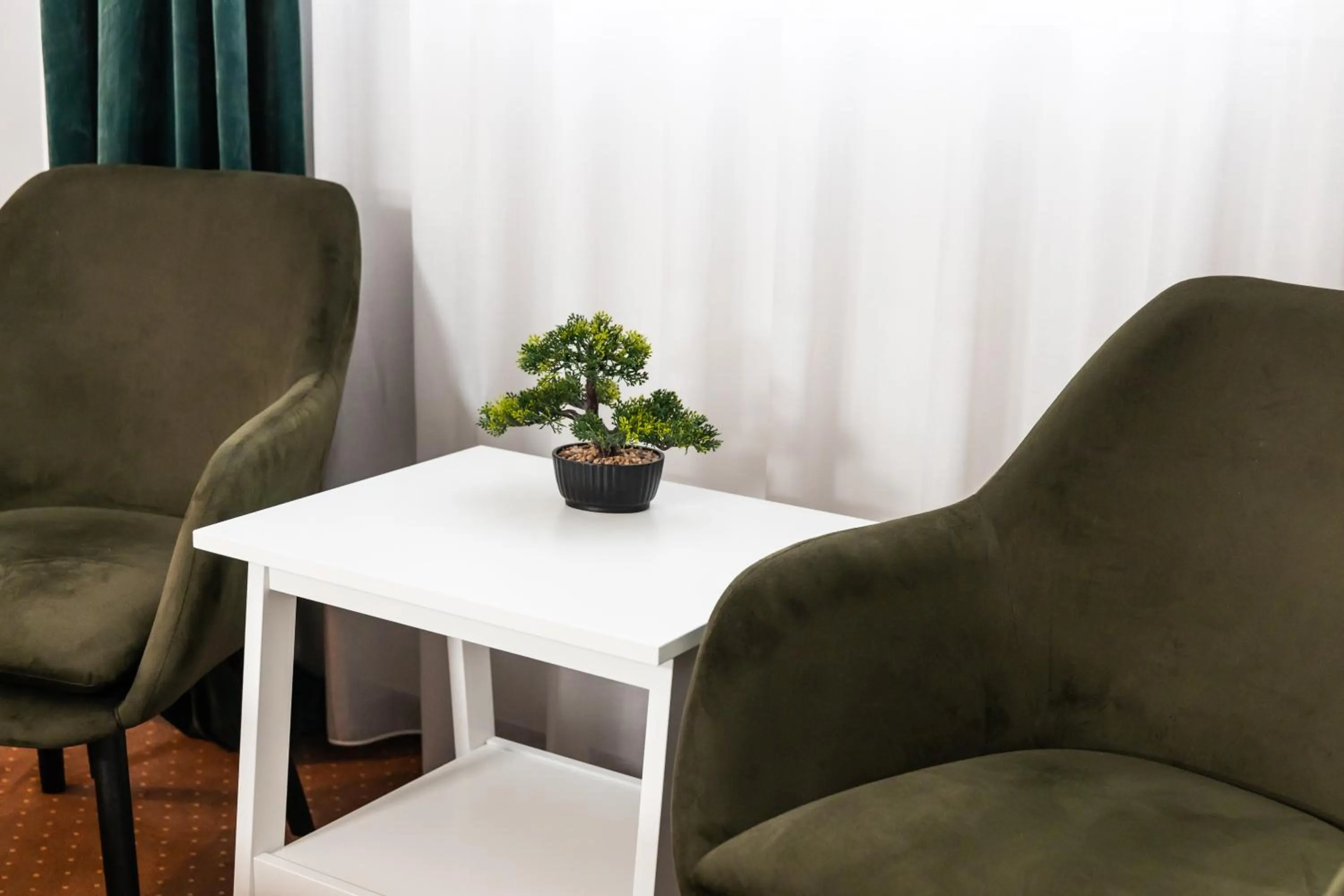 Living room in City Plaza Apartments & Rooms