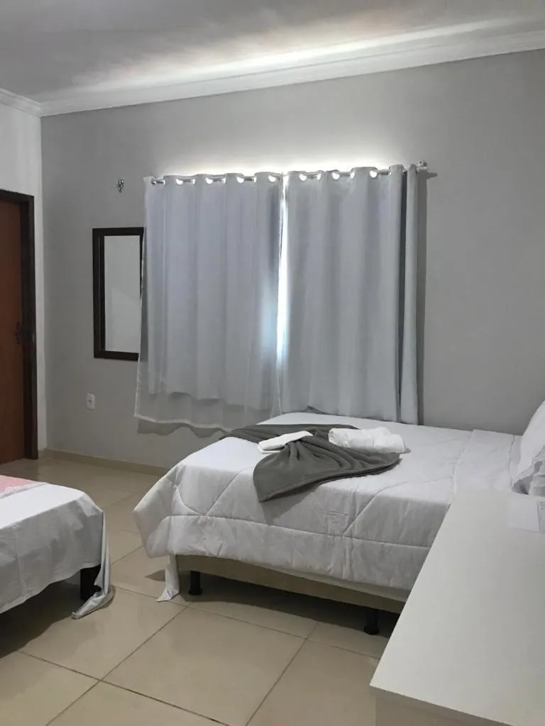 Bed in Pousada Barreirinhas House