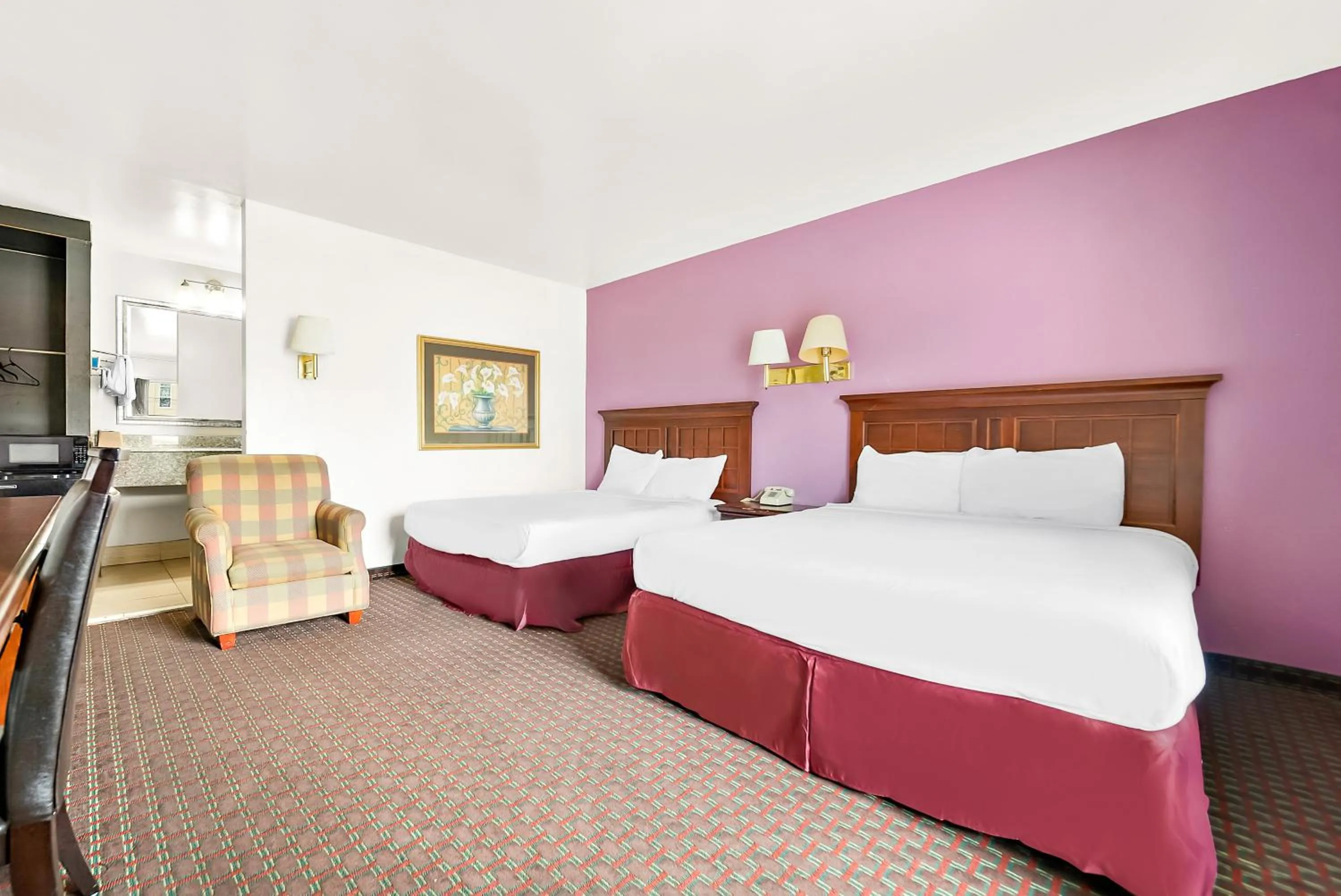 Photo of the whole room, Bed in Capitol Inn and Suites