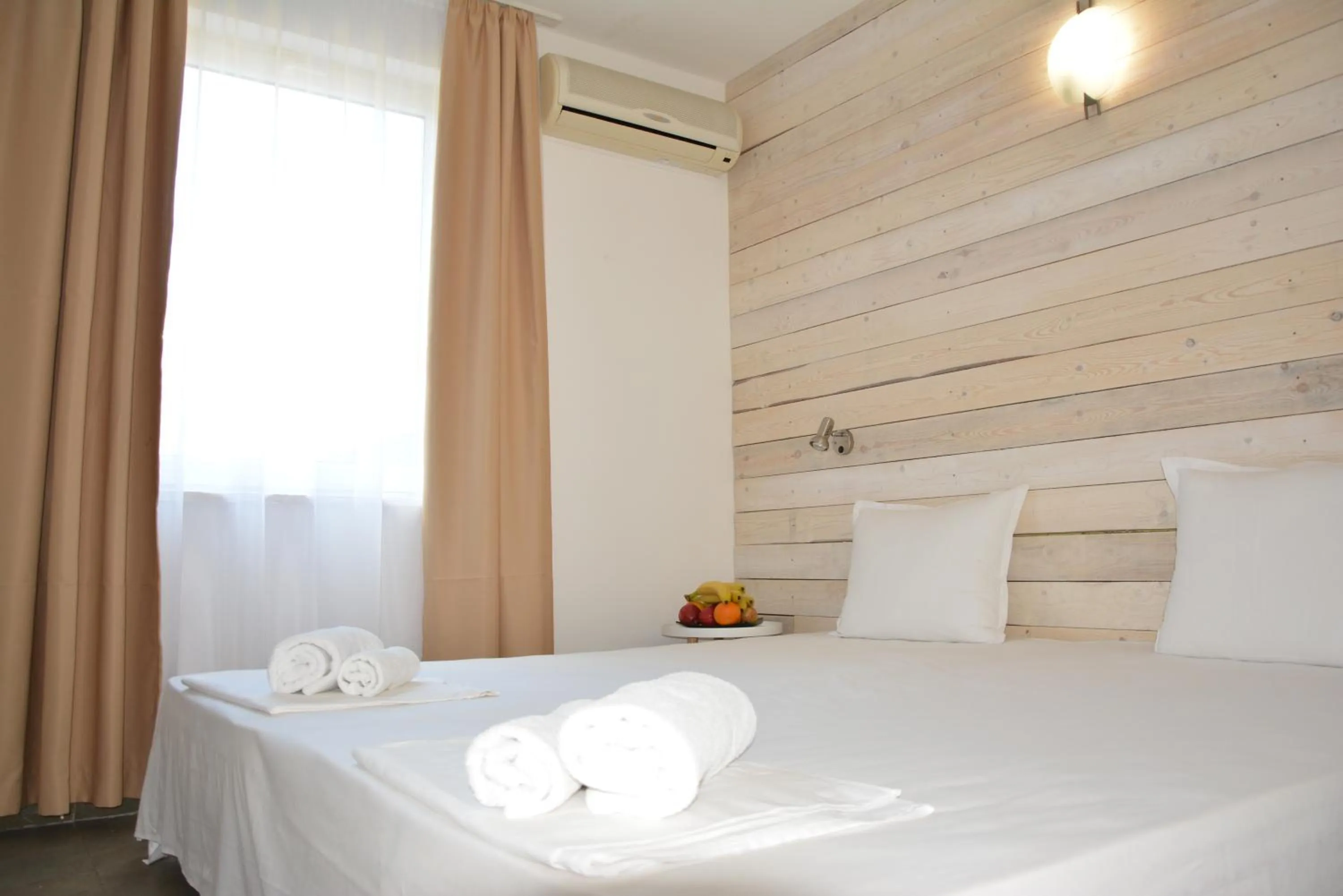 Bed in Milennia Family Hotel