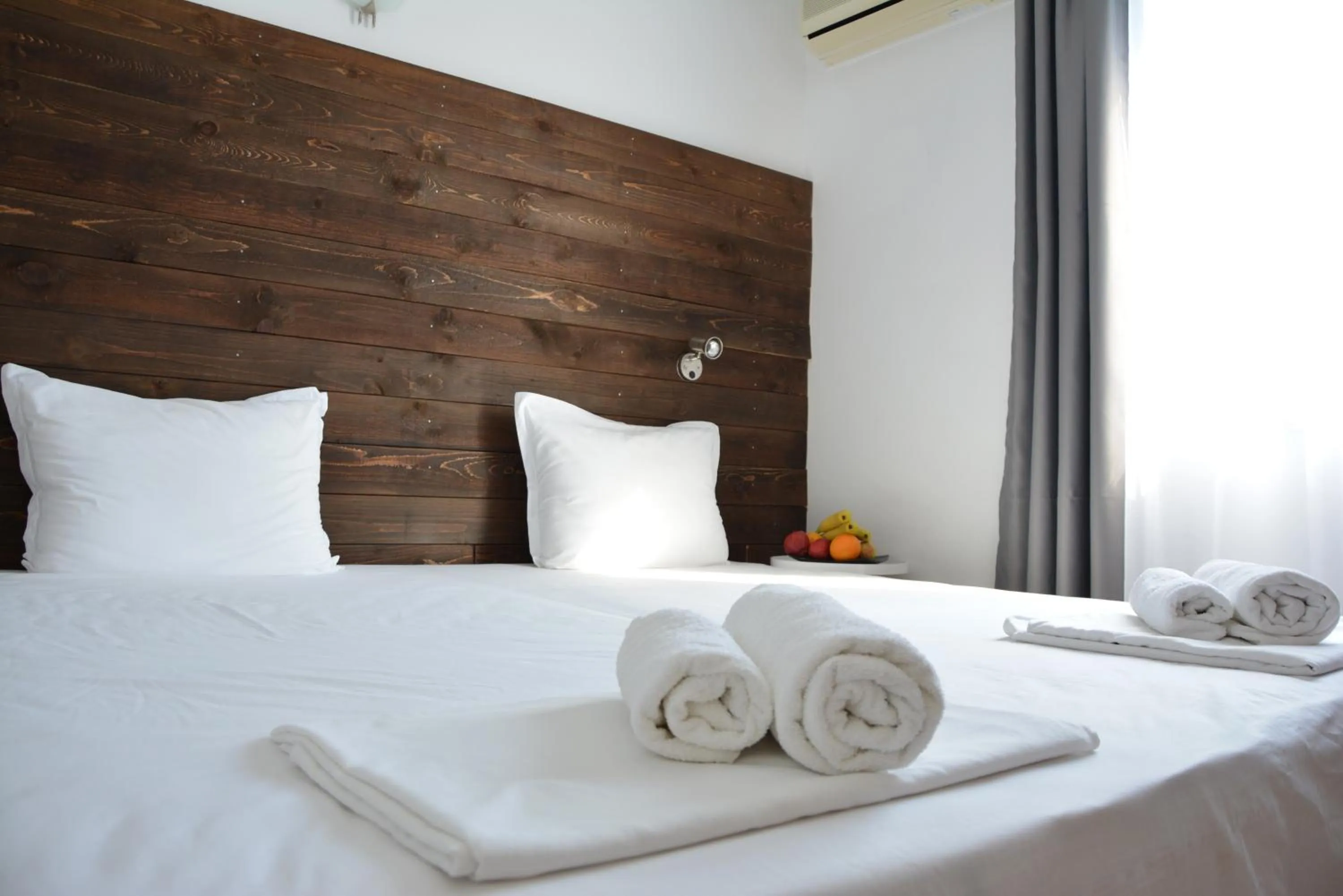 Bed in Milennia Family Hotel