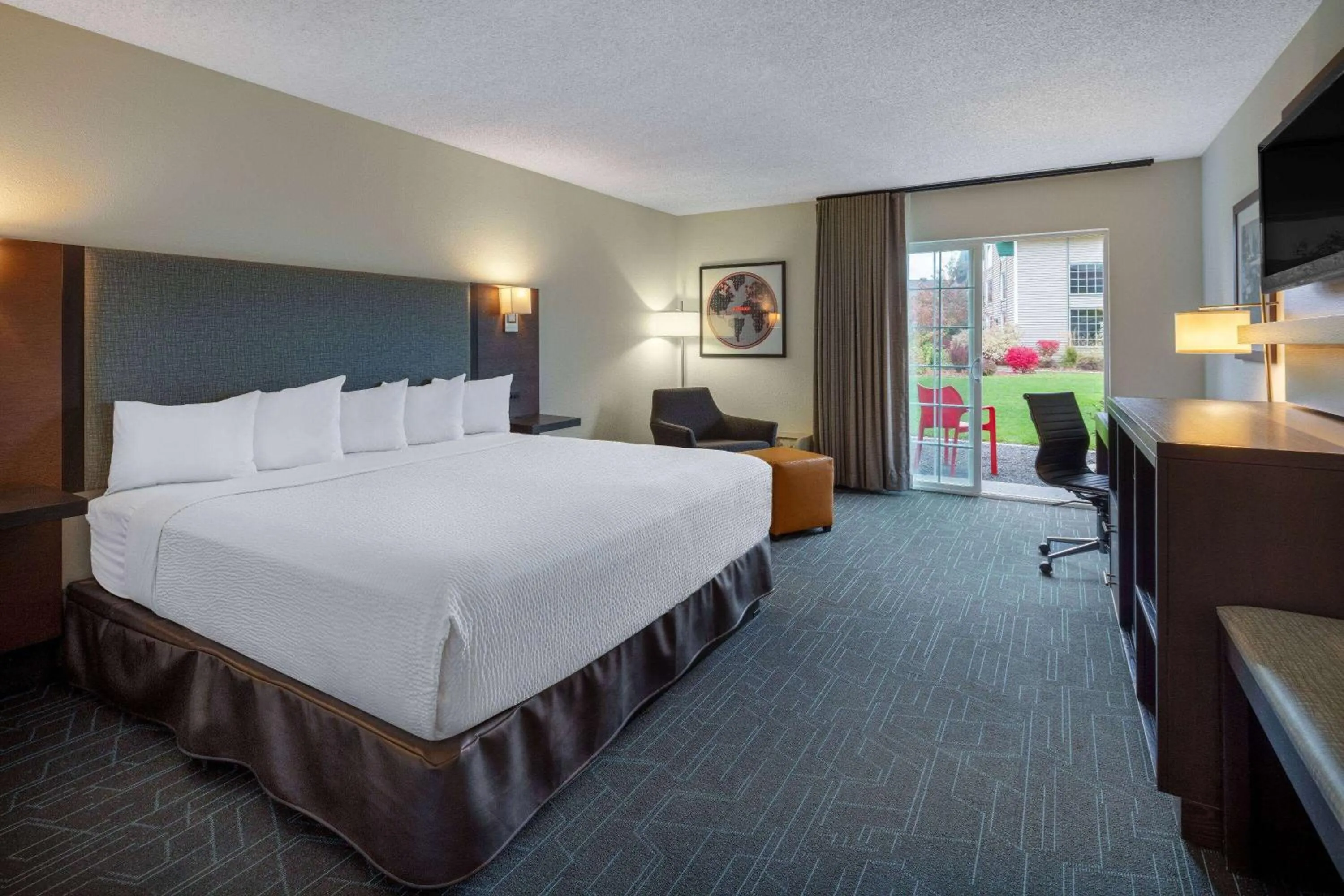 Photo of the whole room, Bed in Ramada by Wyndham Spokane Airport