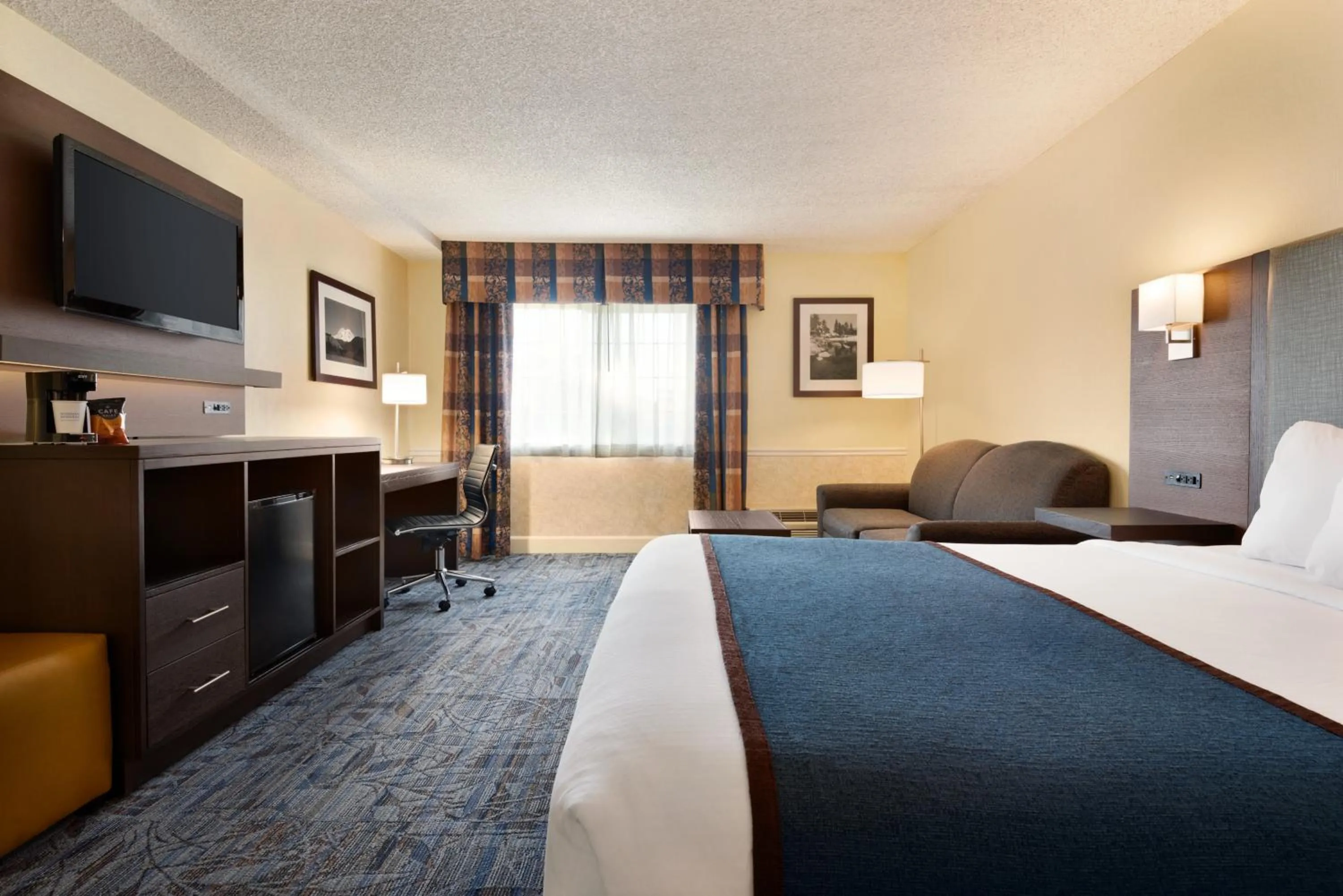 Bed in Ramada by Wyndham Spokane Airport