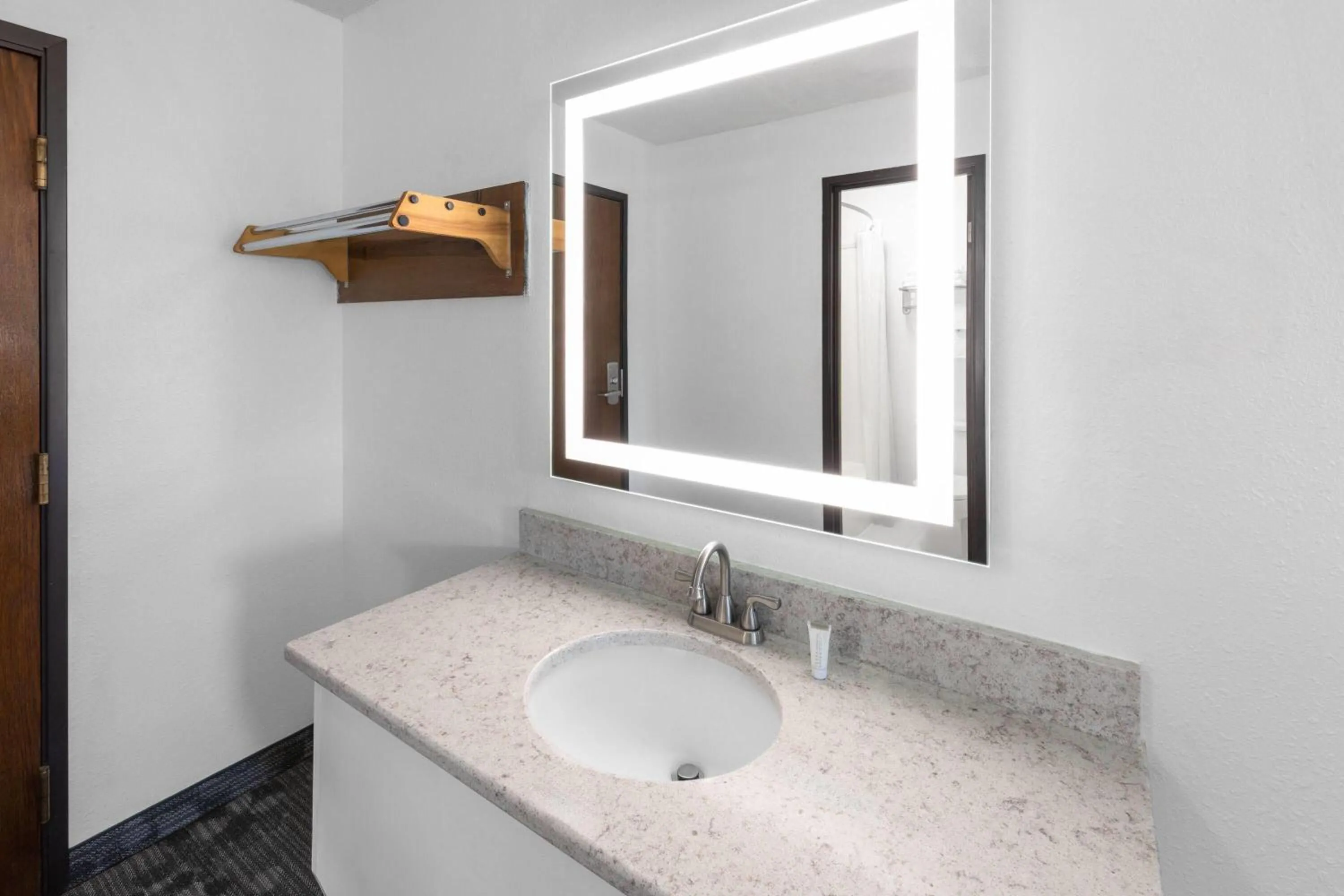 Bathroom in Super 8 by Wyndham Rock Port MO