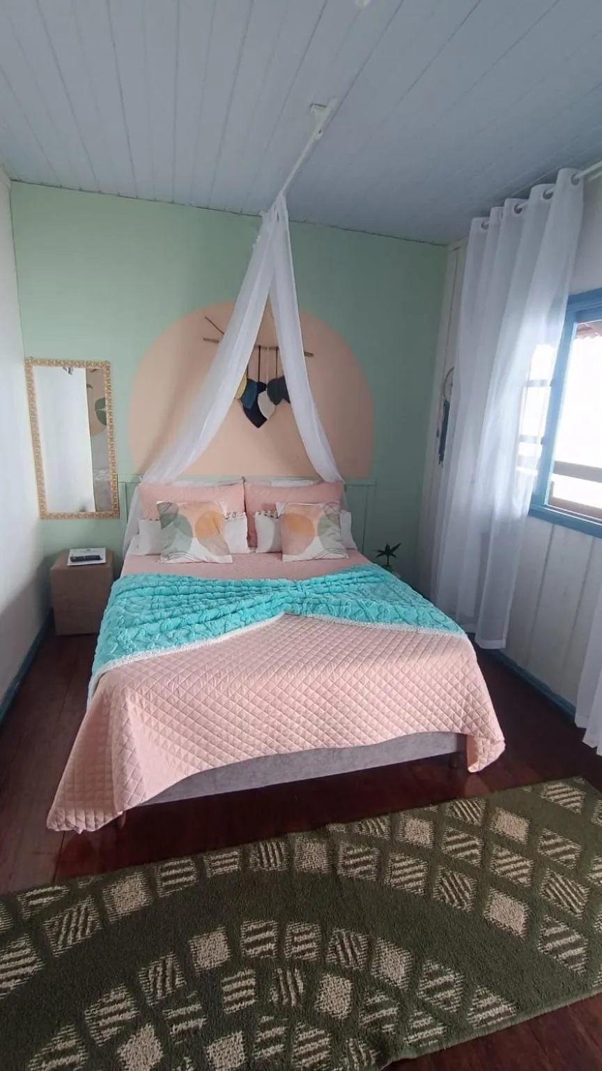 Bed in Pousada Vida Simples