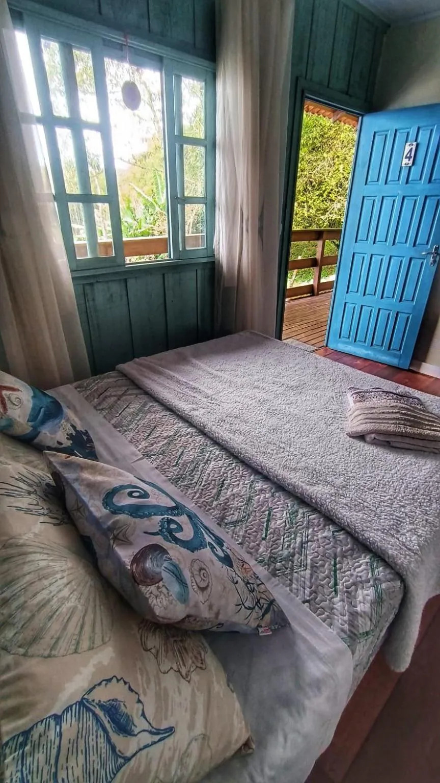 Bed in Pousada Vida Simples