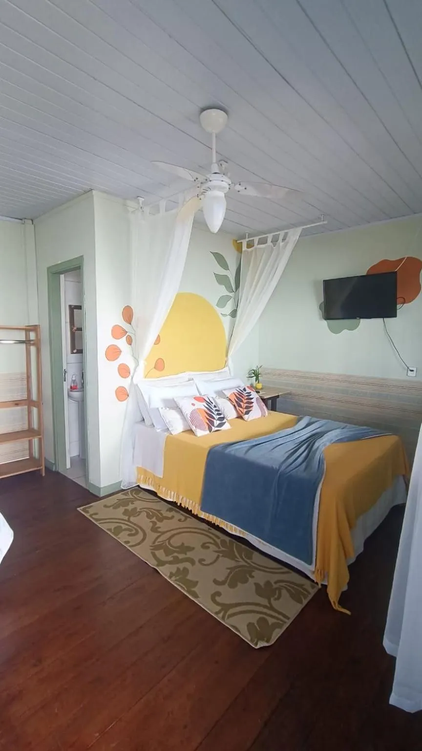 Bed in Pousada Vida Simples