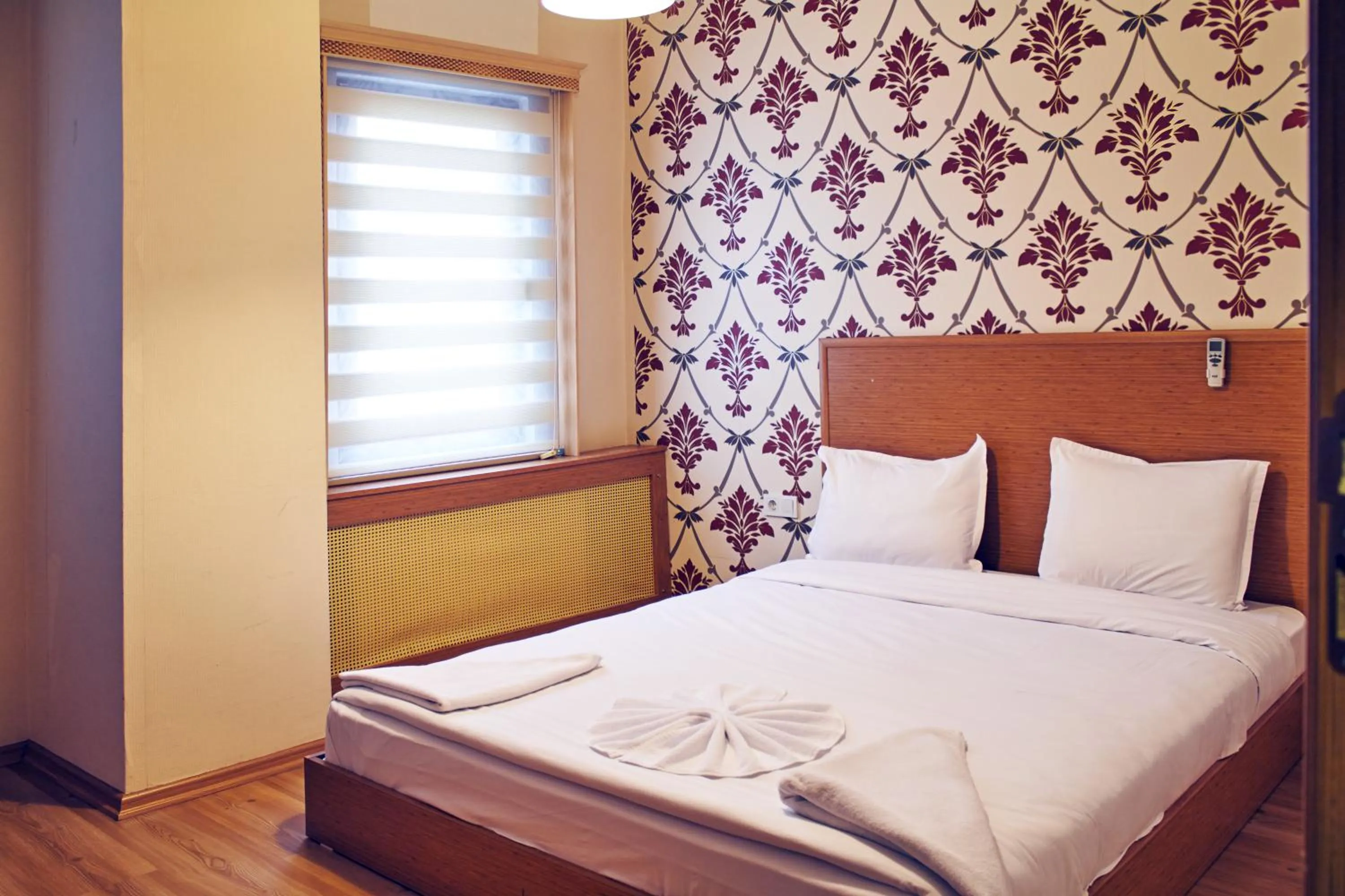 Bed in TAXİM ELEGANCE SUİTES