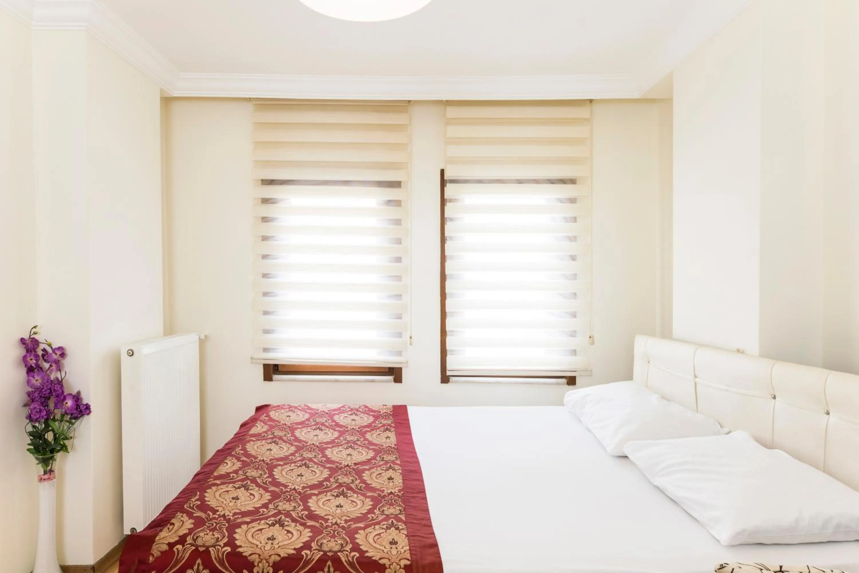 Bed in TAXİM ELEGANCE SUİTES