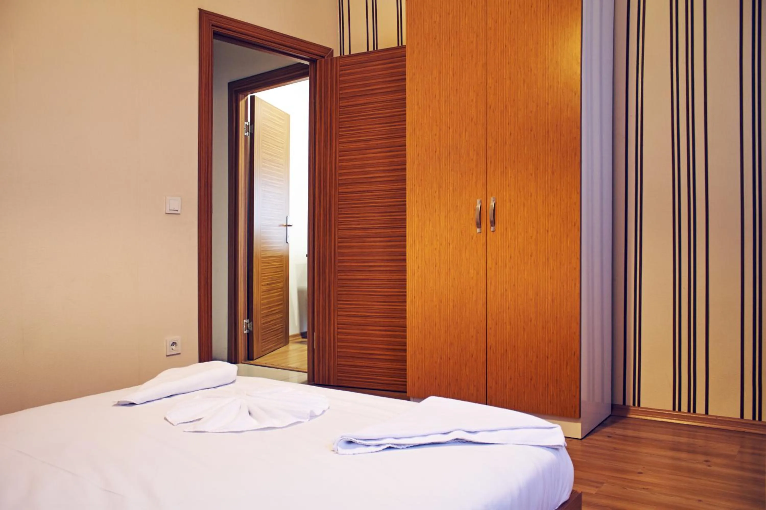 Bed in TAXİM ELEGANCE SUİTES