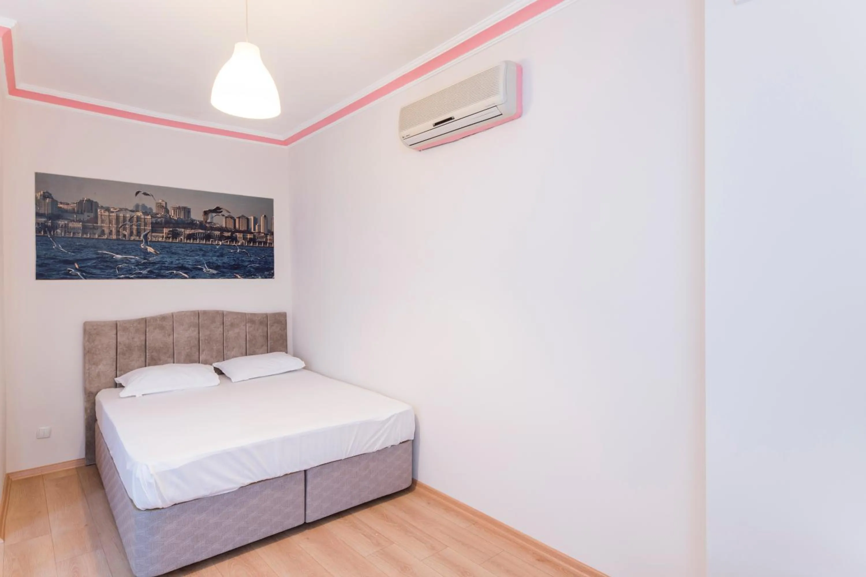 Bed in TAXİM ELEGANCE SUİTES