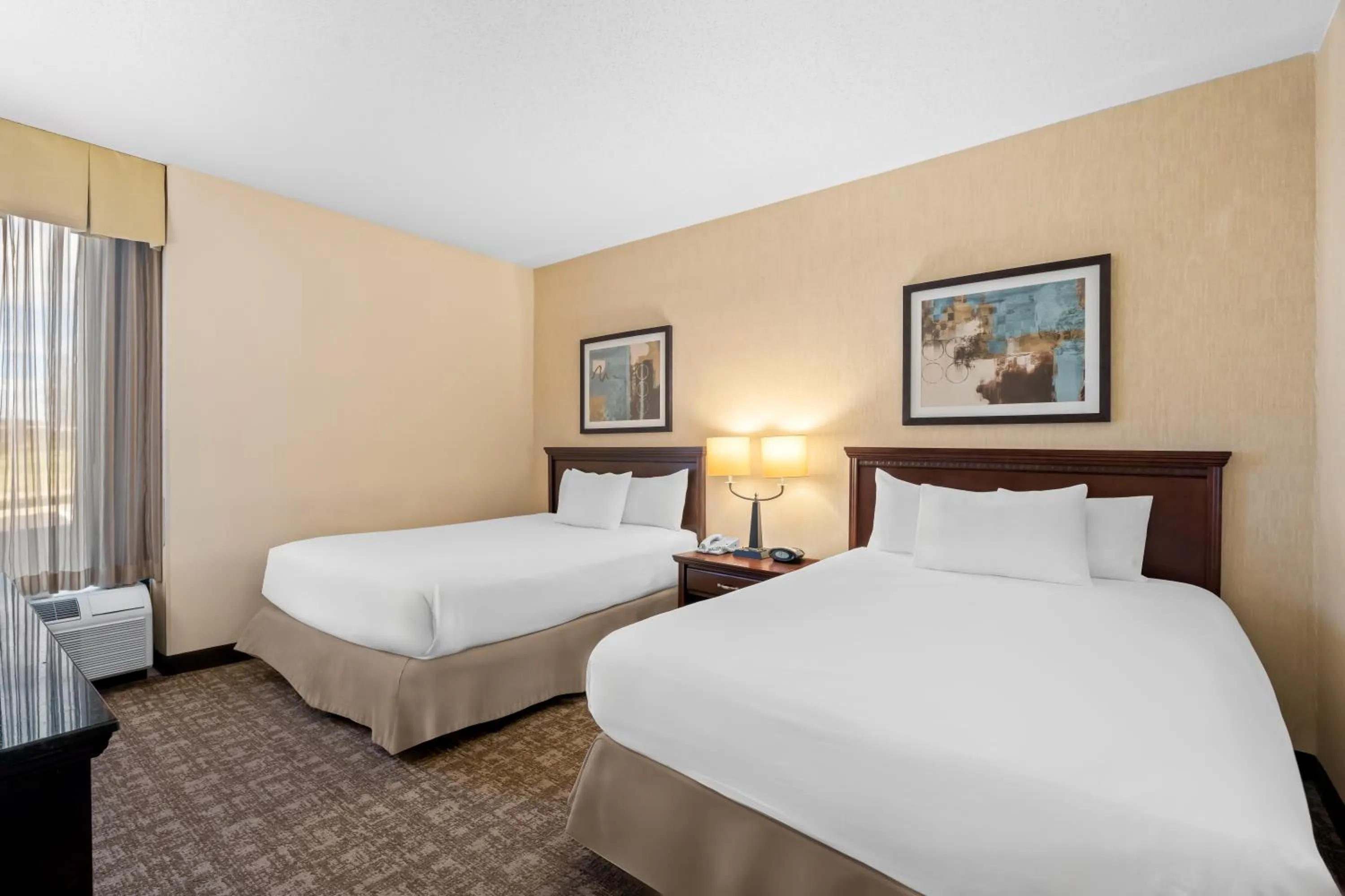 Bed in Prado Hotel by Choice Hotels