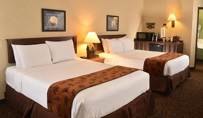 Bed in Boarders Inn & Suites by Cobblestone Hotels in Waukon