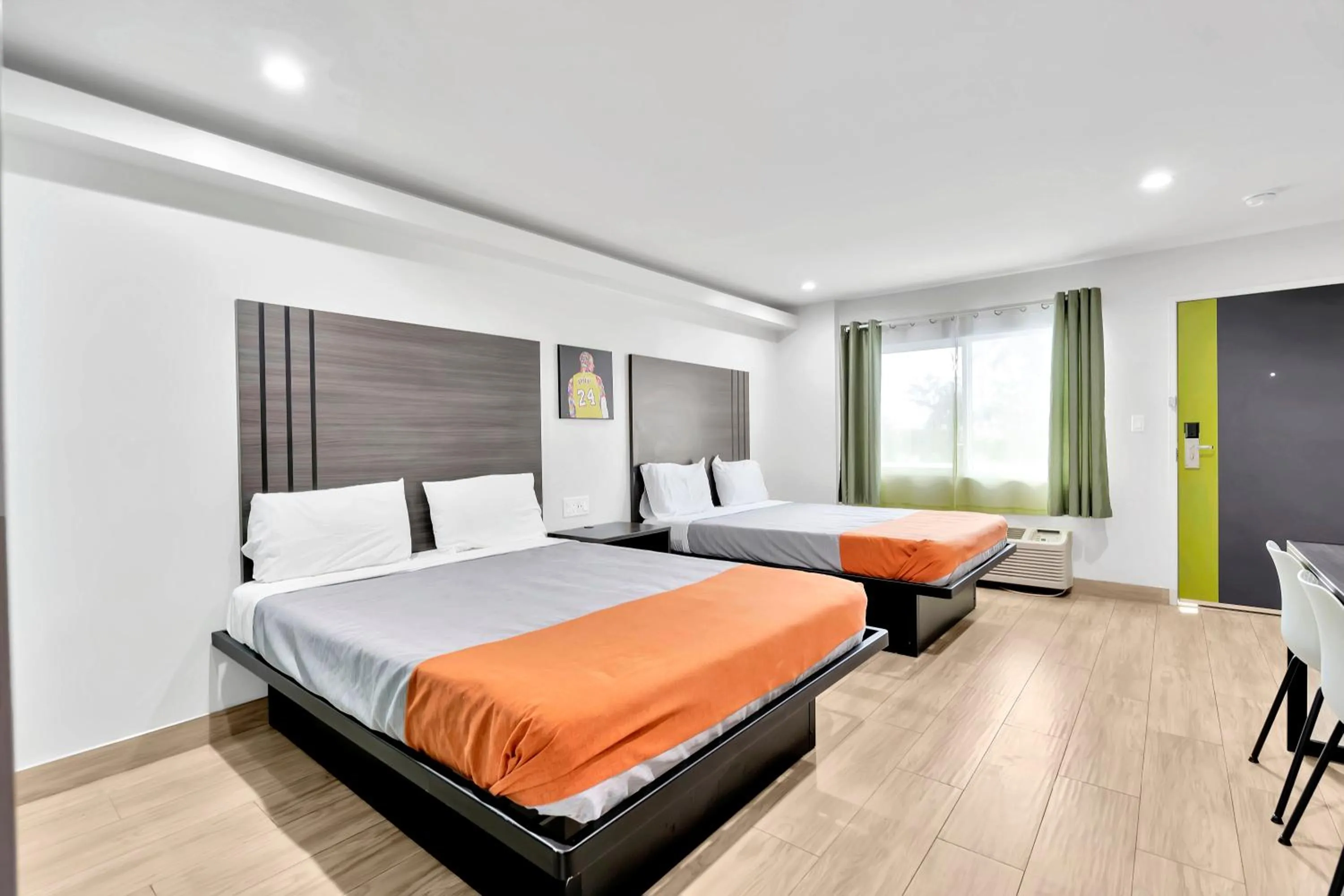 Bed in Exclusivo Inn and Suites
