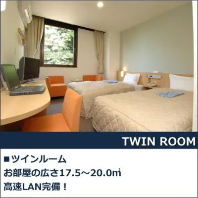 Bed in Hamada New Castle Hotel