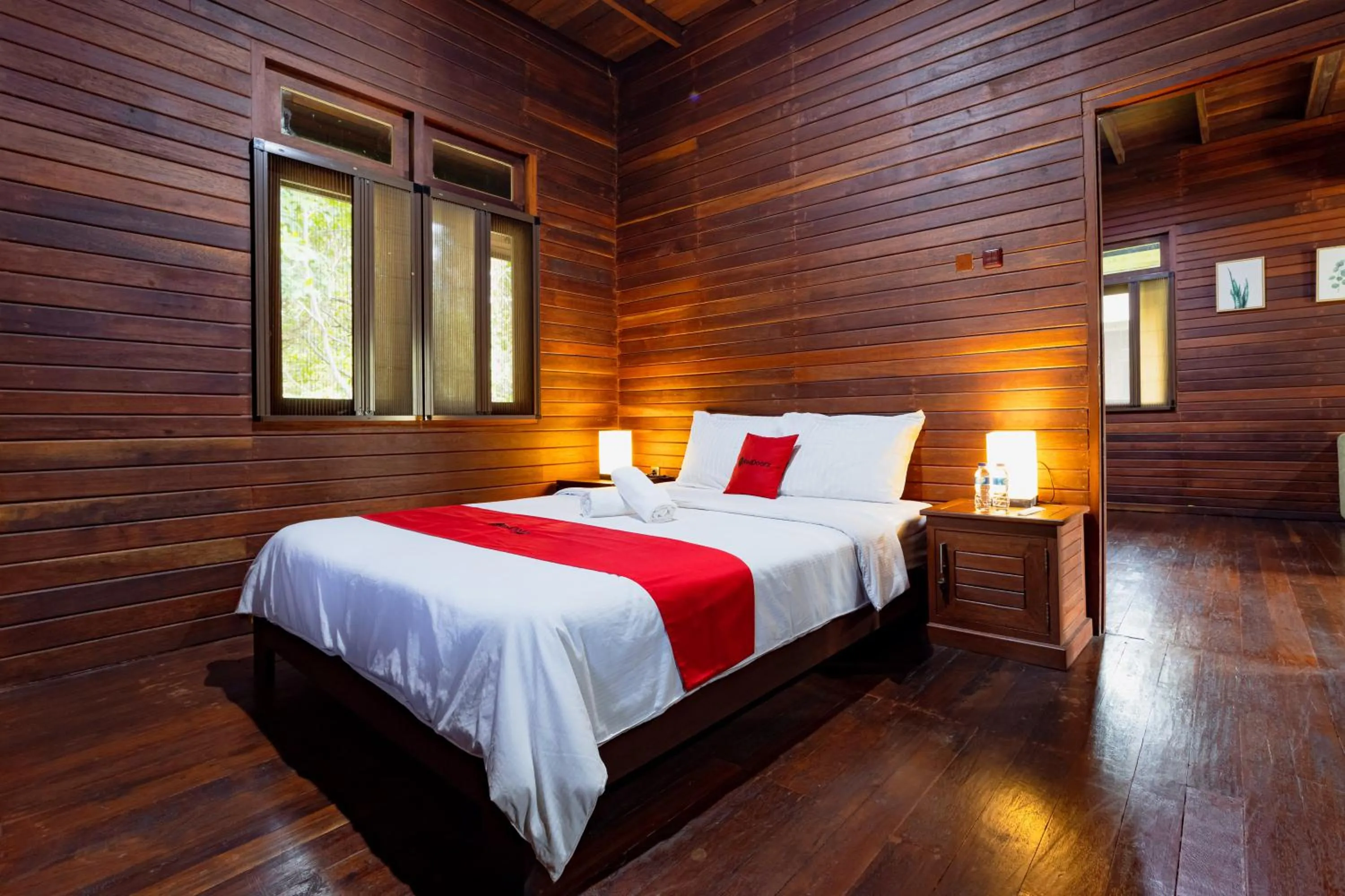 Bedroom, Bed in RedDoorz Resort @ Taman Wisata Mangrove