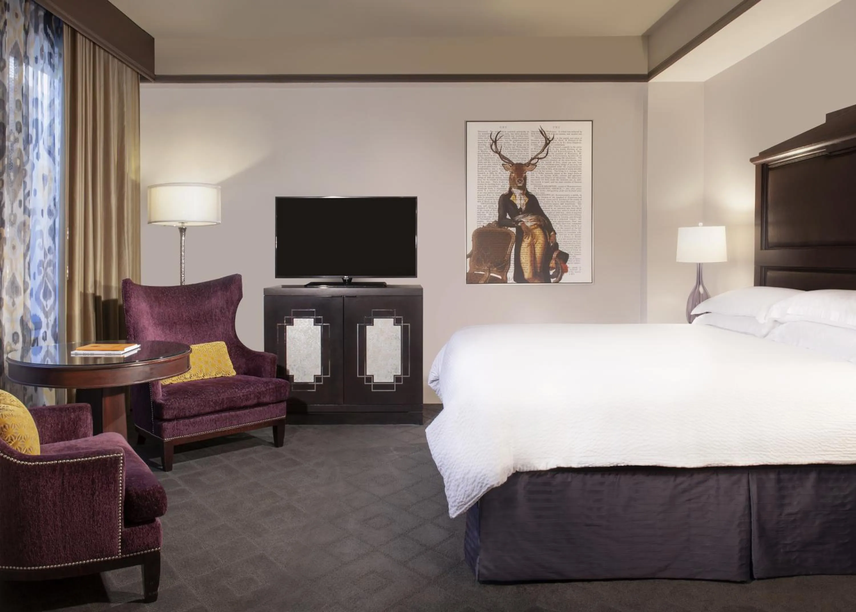 Bed in The Ashton Hotel