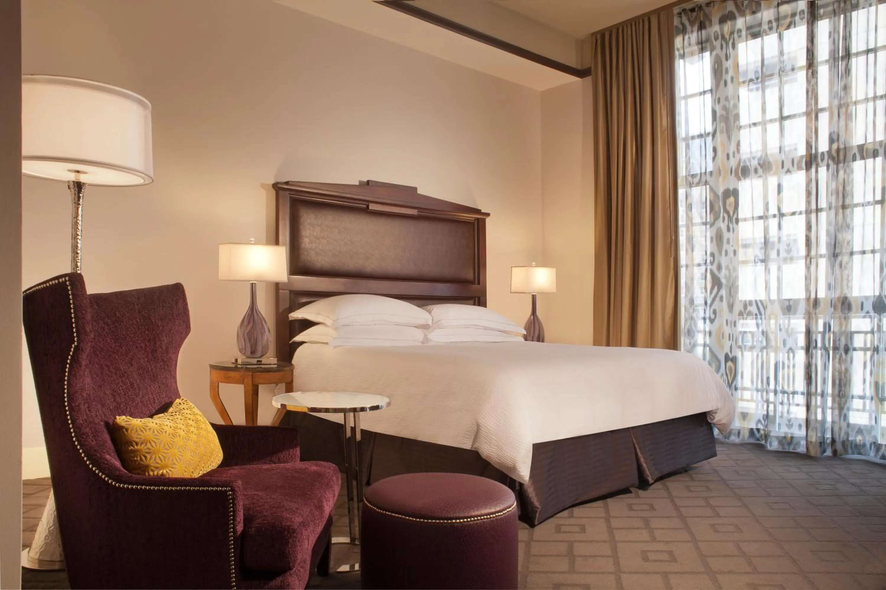 Bed in The Ashton Hotel