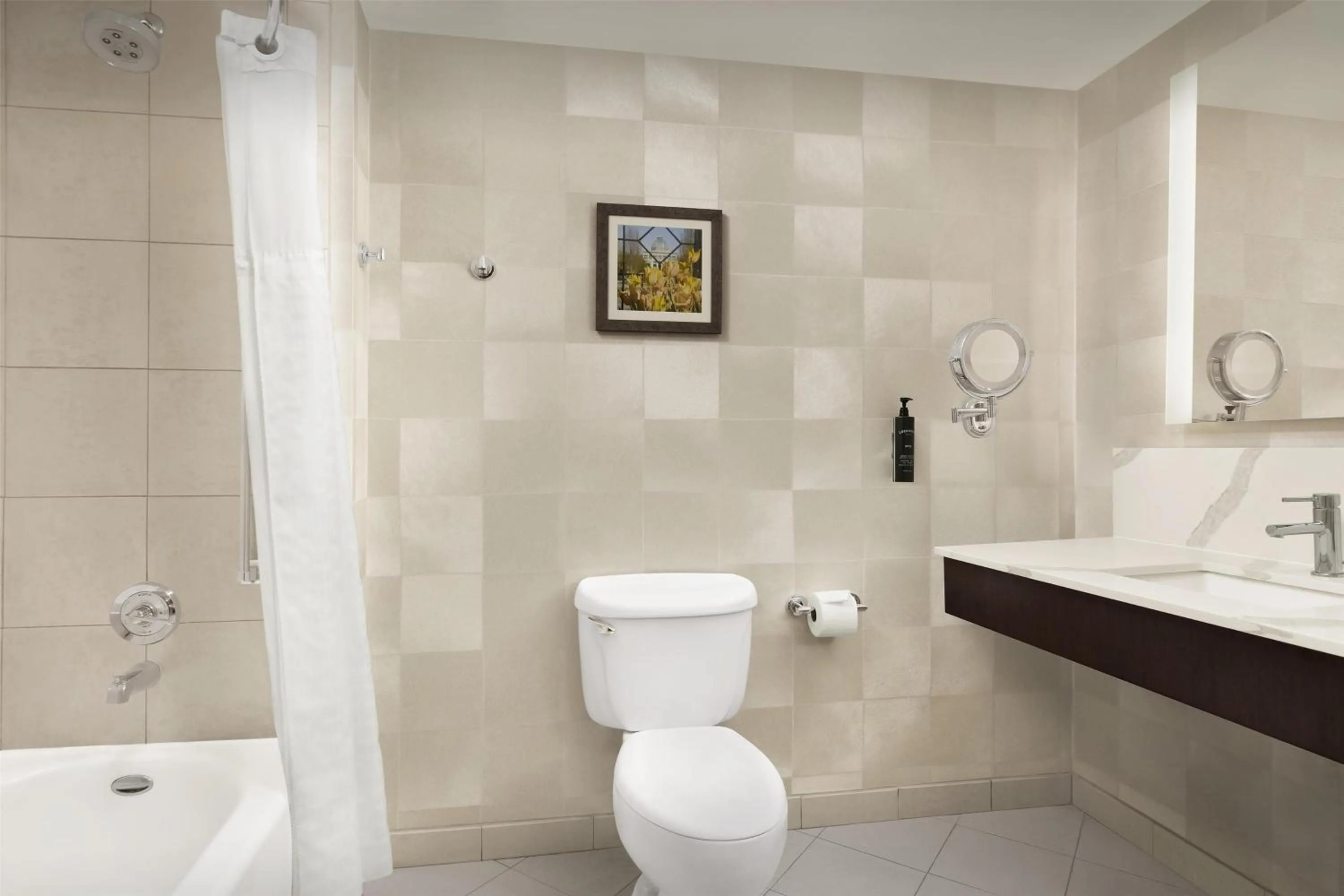 Bathroom in Virginia Crossings Hotel, Tapestry Collection by Hilton