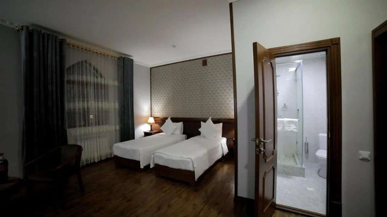 Bed in Erkin Palace Hotel