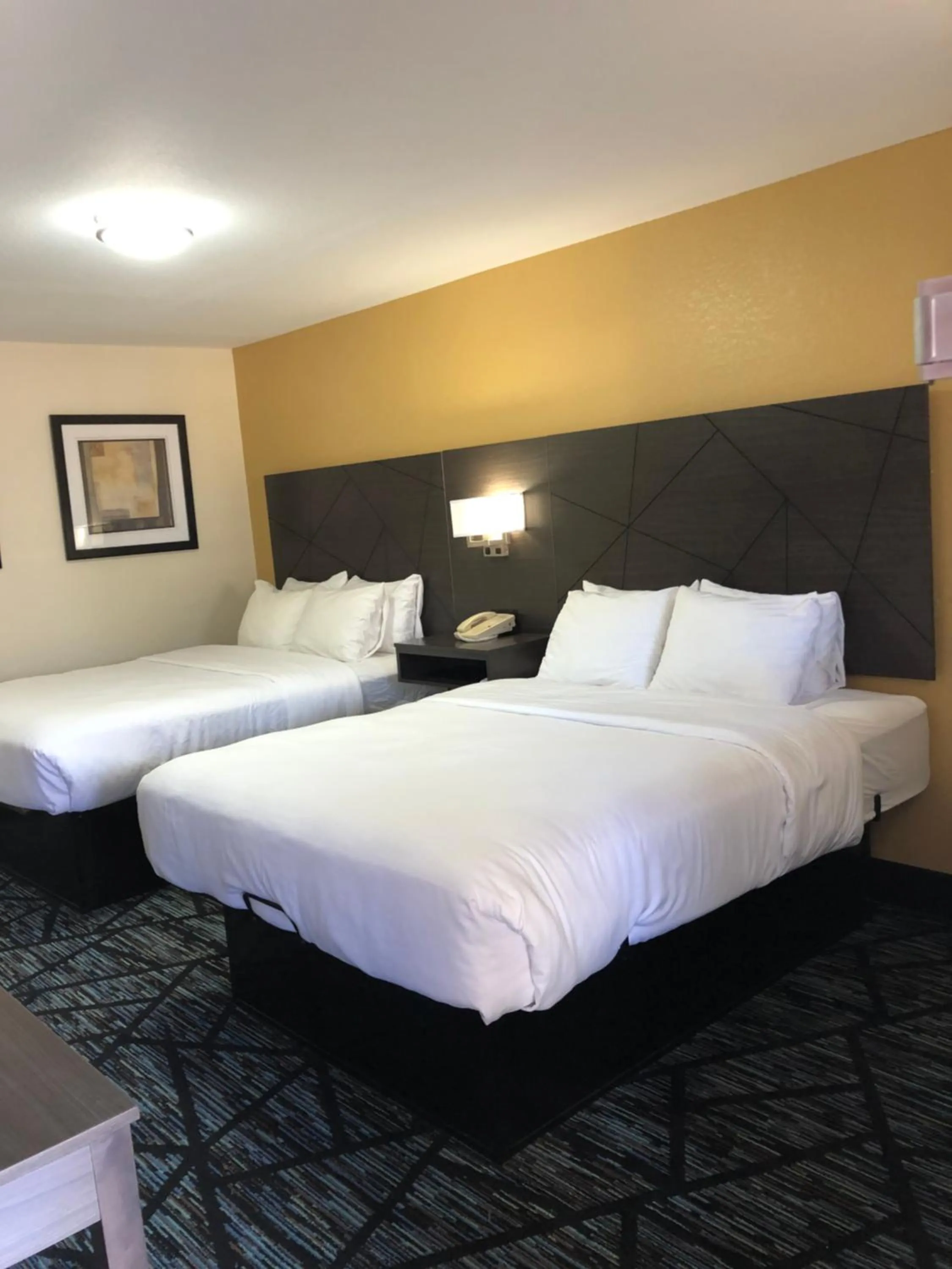 Bed in Quality Inn Cameron