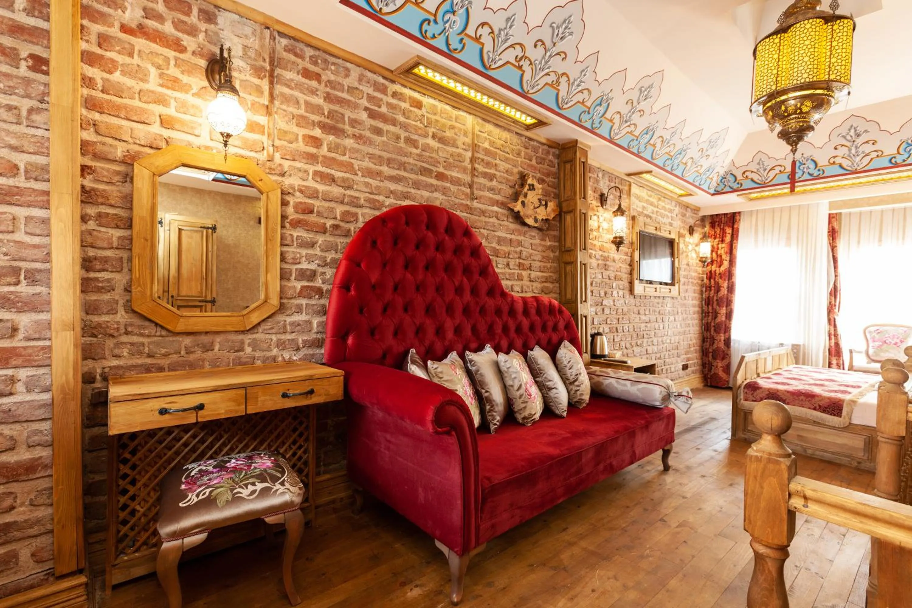 Living room in Enderun by Otantik Suites