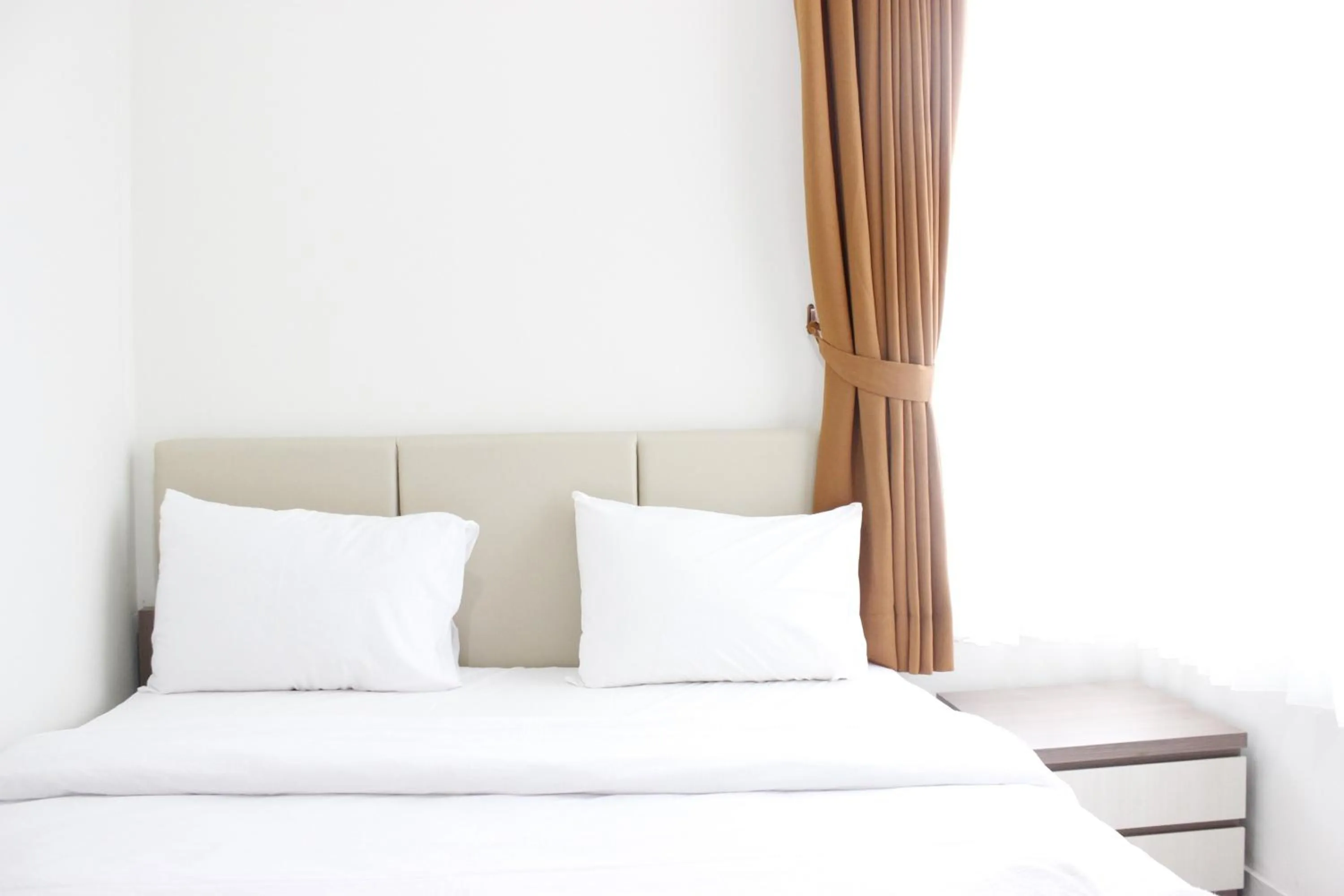 Bed in Cozy 2BR Apartment @ Newton Residence By Travelio