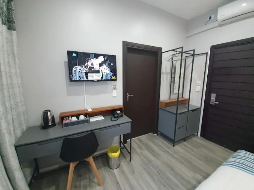 Bed in La Orchard Hotel