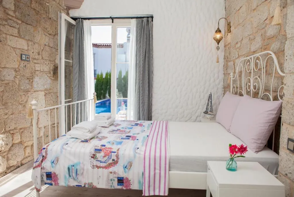 Bed in Kybele Suites Alaçatı