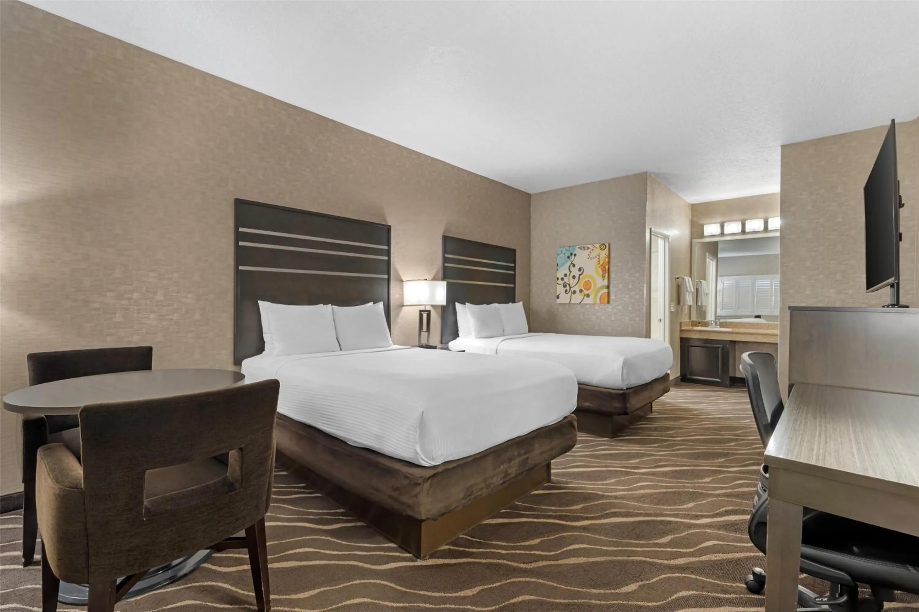 Bedroom, Bed in Best Western Plus Park Place Inn - Mini Suites