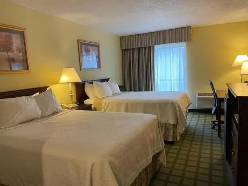 Bed in Days Inn & Suites by Wyndham Sutton Flatwoods