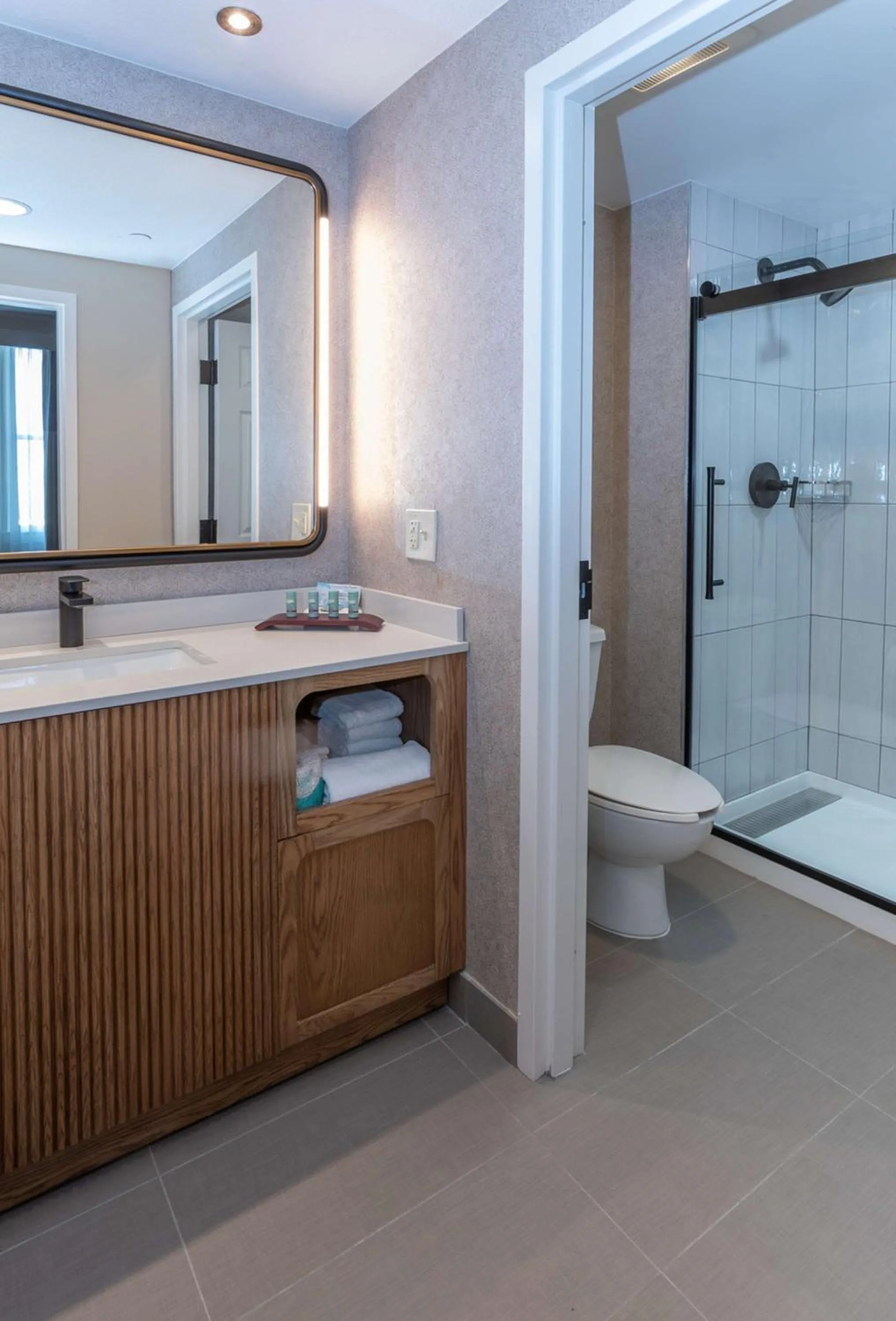 Shower in Hotel Flor Tampa Downtown, Tapestry Collection By Hilton