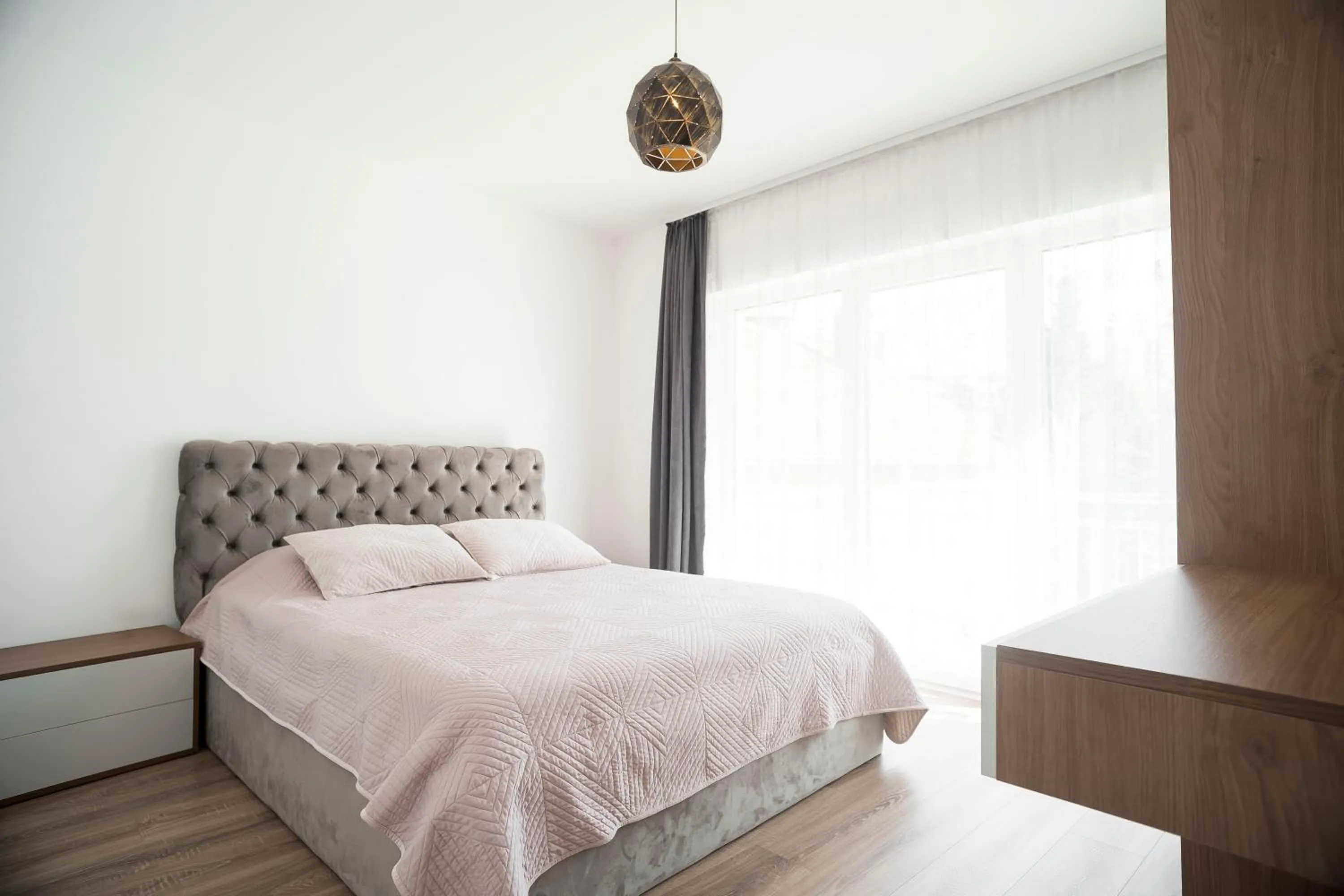 Bed in Lux Apartments