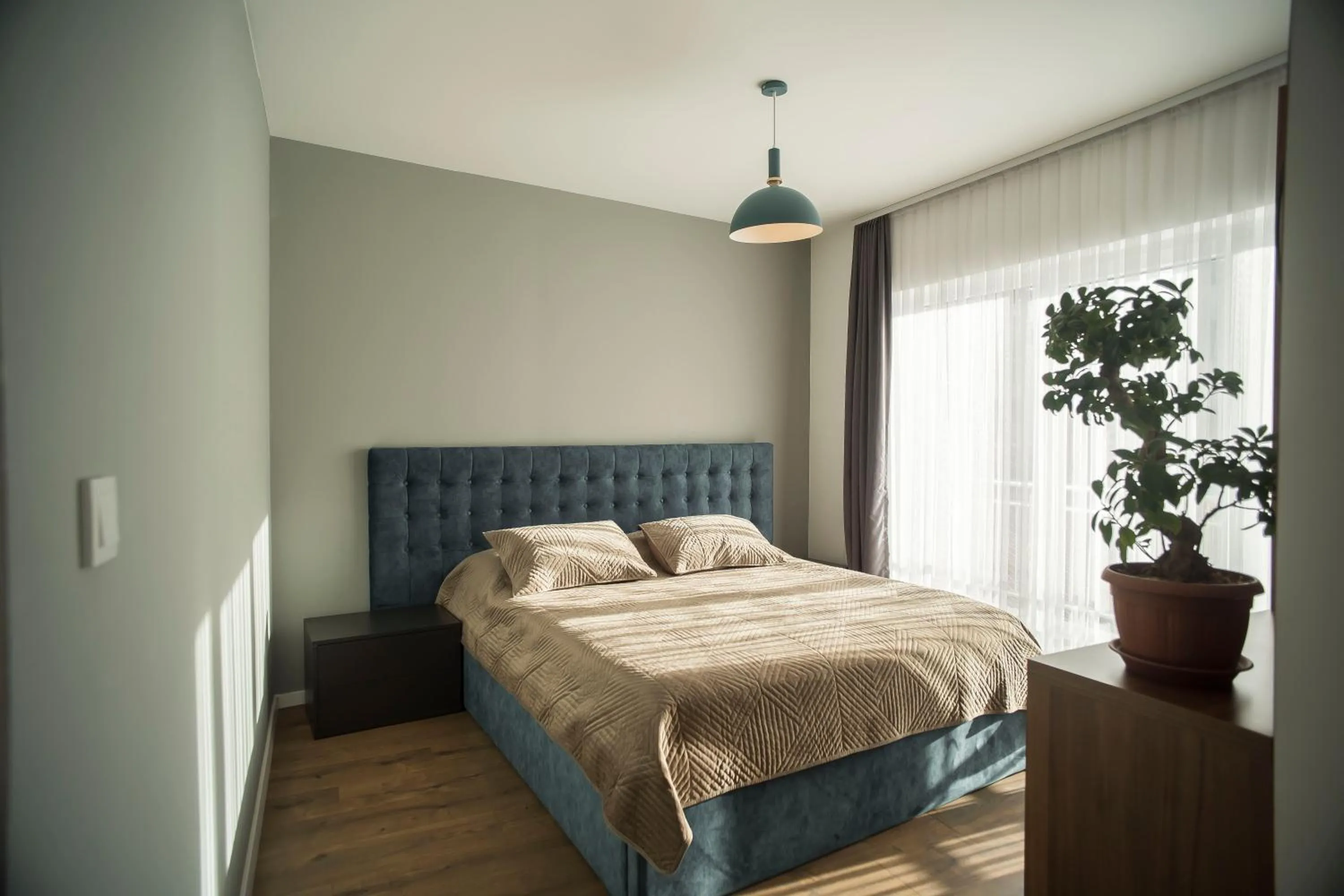 Bed in Lux Apartments