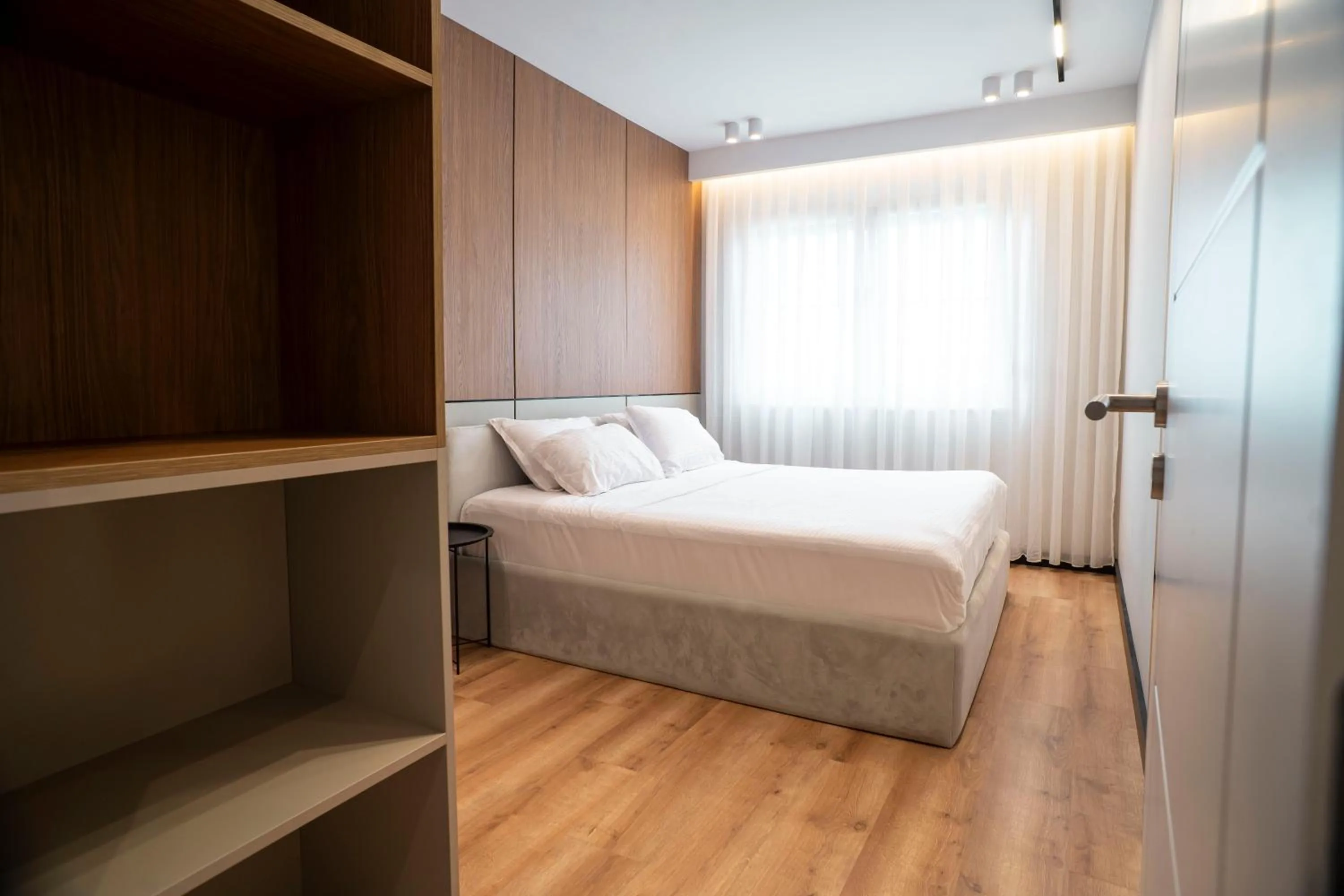 Bed in Lux Apartments