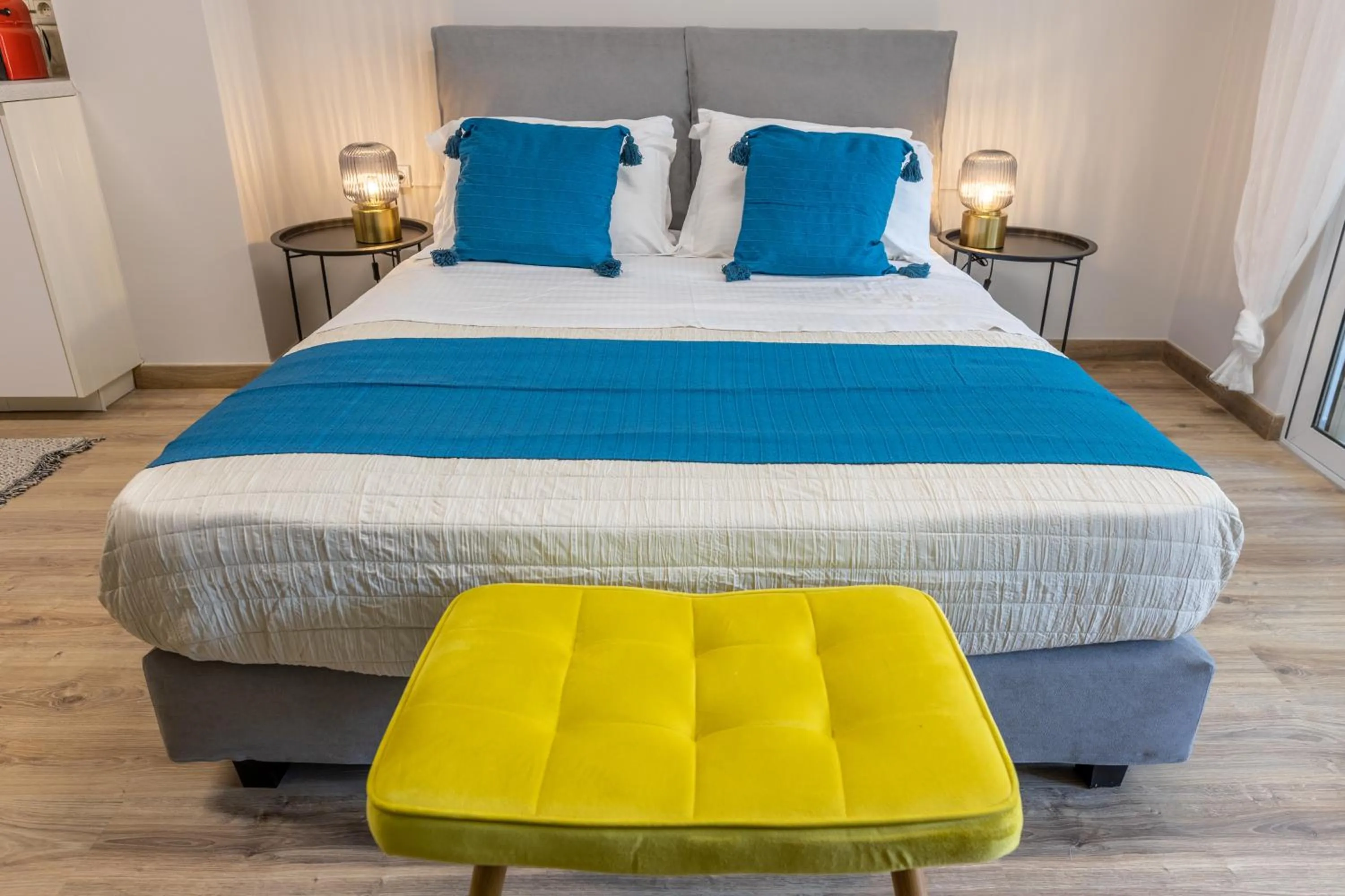 Bed in Athenian Sensations Apartments and Suites in the Heart of Athens