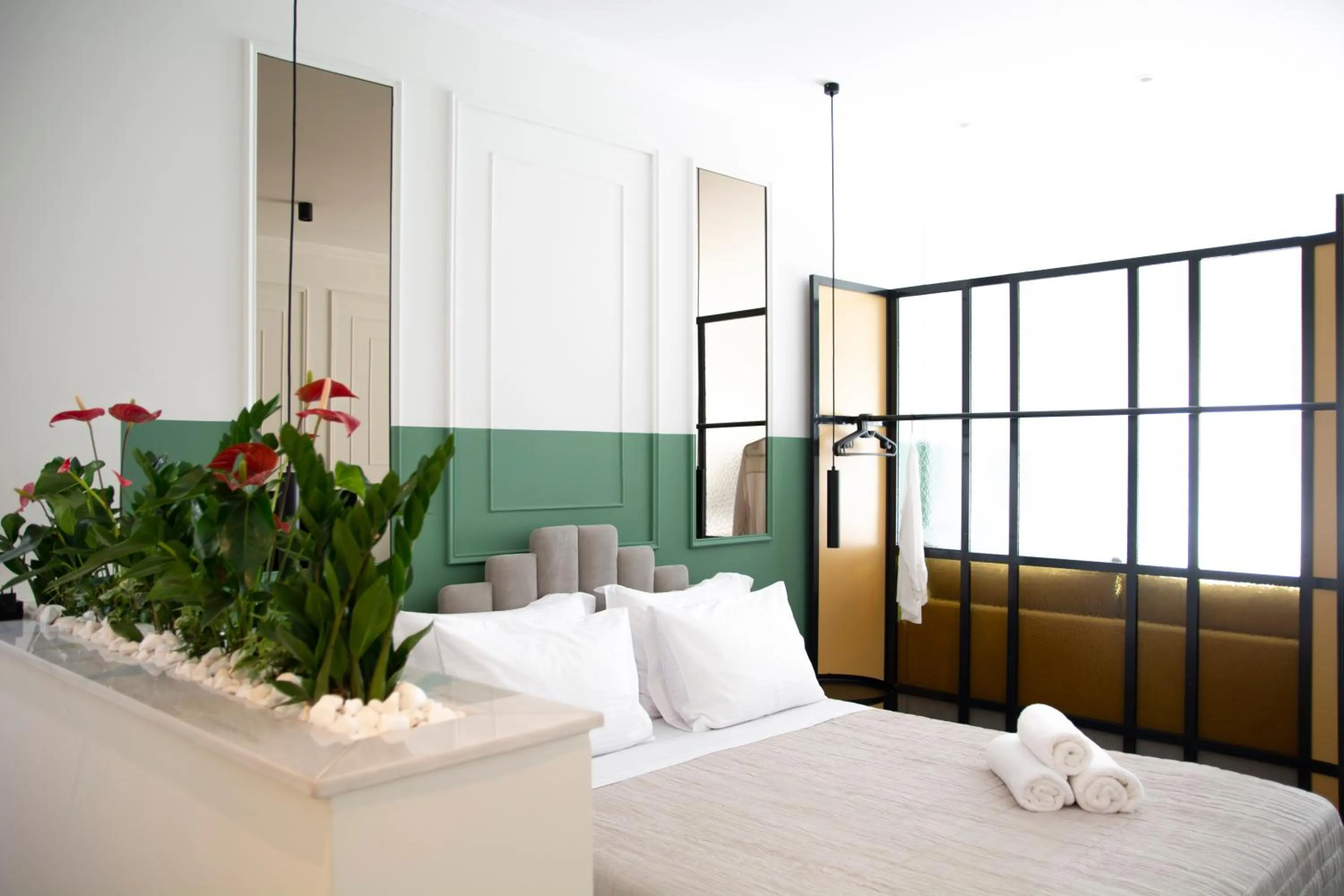 Bed in Athenian Sensations Apartments and Suites in the Heart of Athens