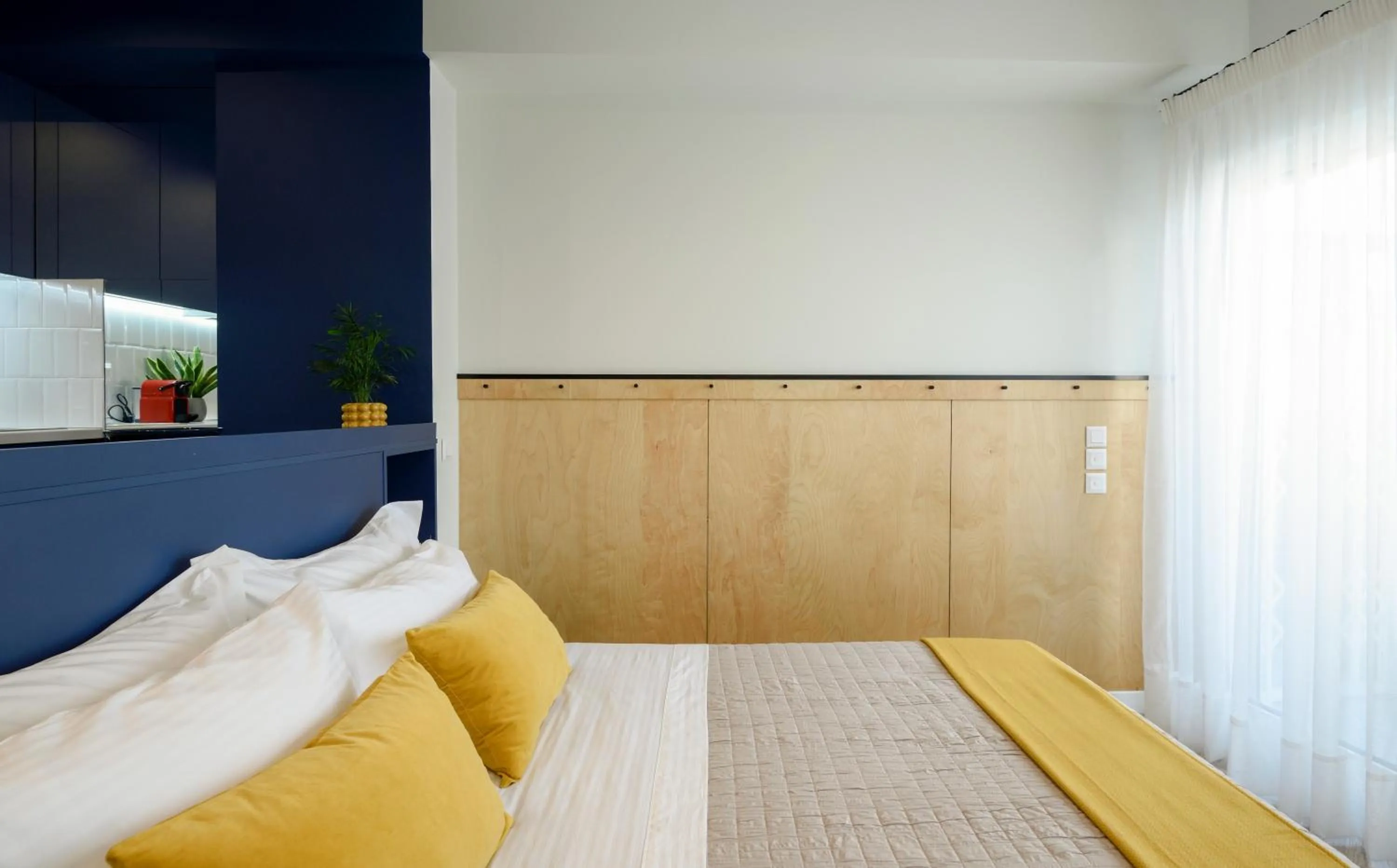 Bed in Athenian Sensations Apartments and Suites in the Heart of Athens