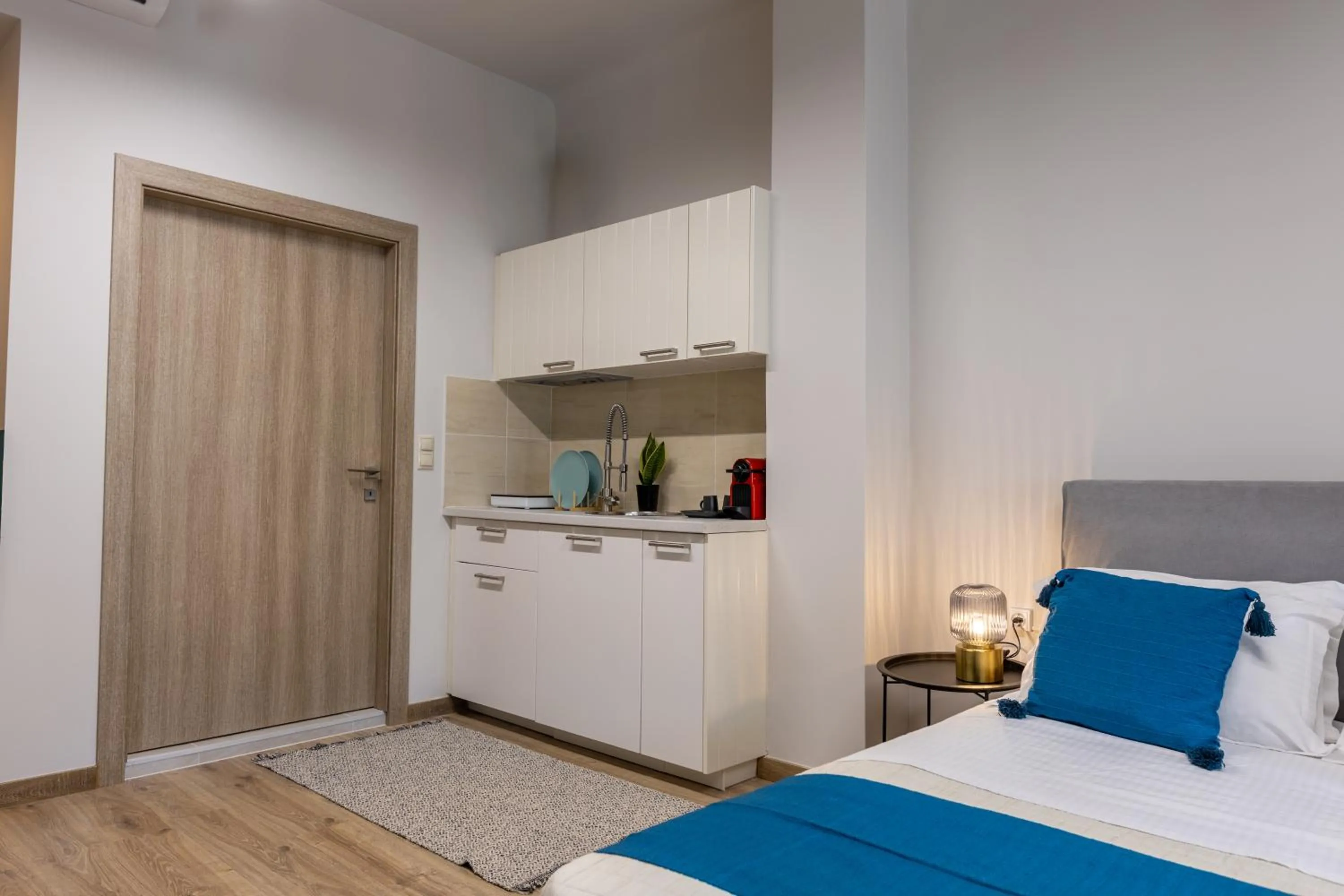 Bed in Athenian Sensations Apartments and Suites in the Heart of Athens