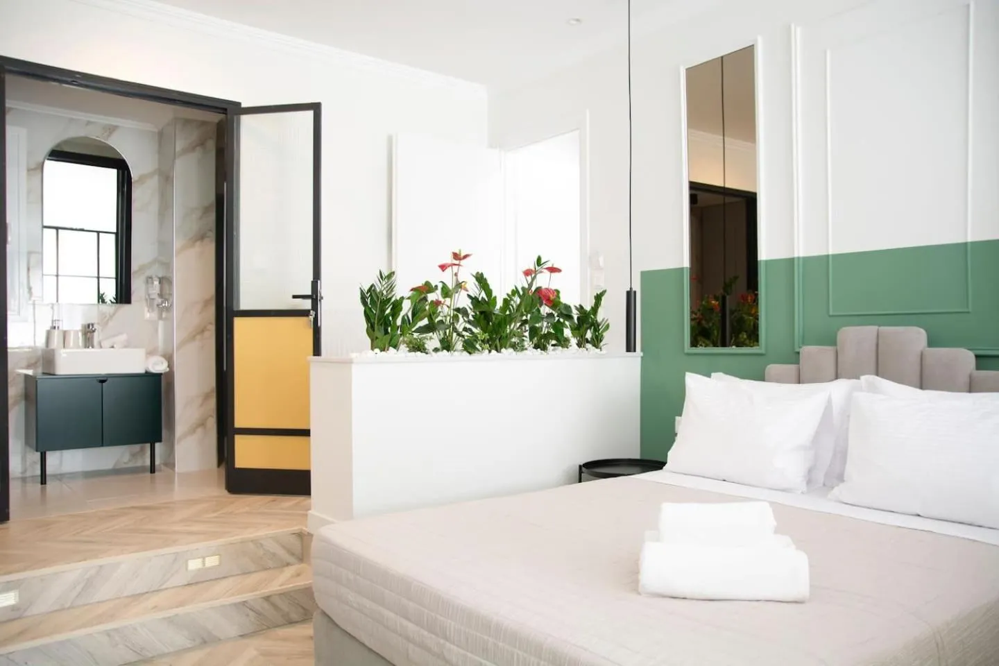 Bed in Athenian Sensations Apartments and Suites in the Heart of Athens
