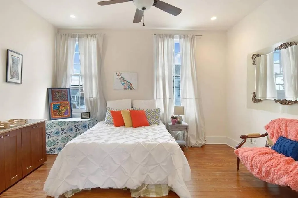 Seating area, Bed in Freret Apartments near Streetcar & Tulane