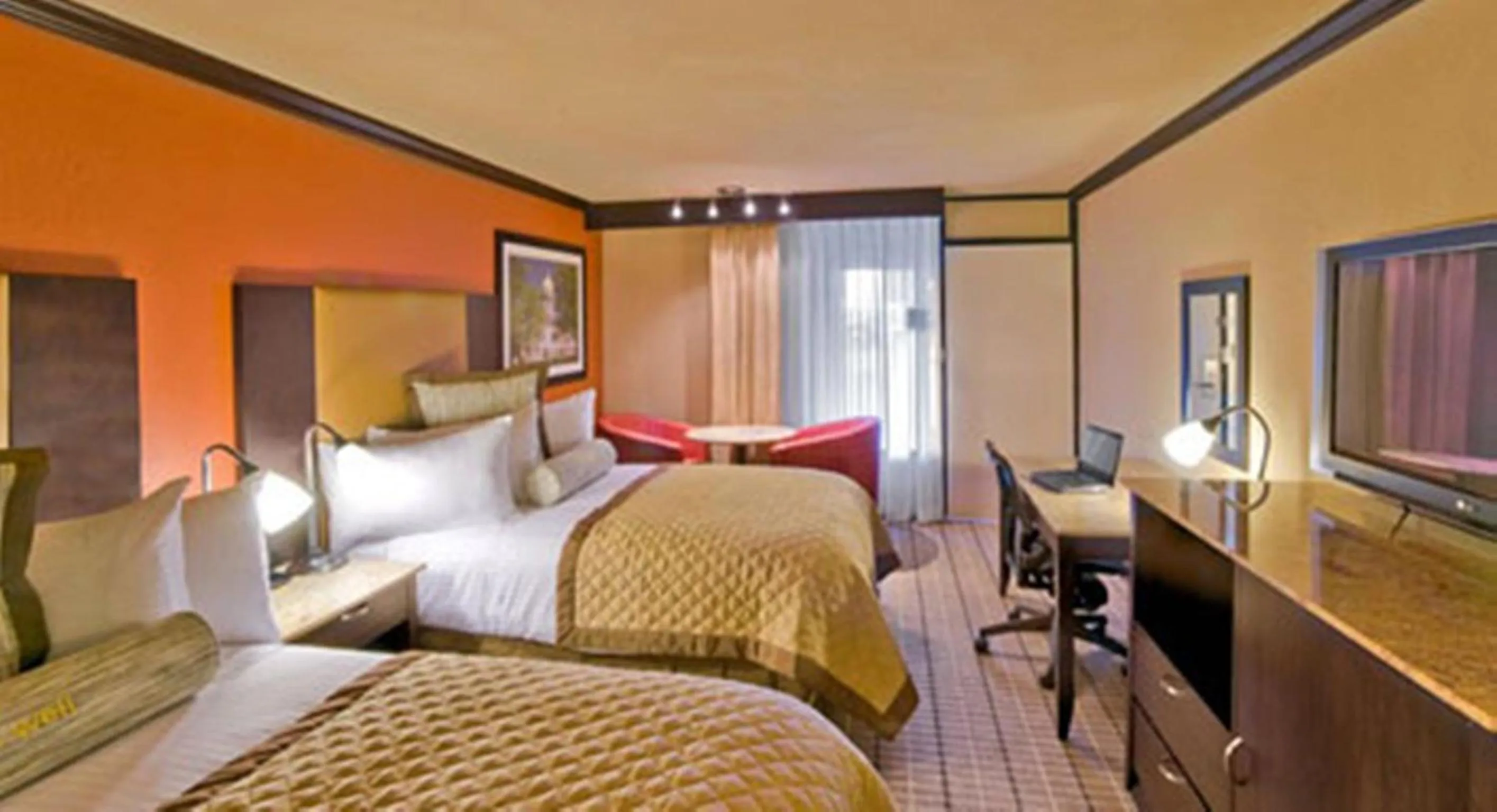 Photo of the whole room, Bed in Wyndham Garden Oklahoma City Resort & Conference Hotel Near Airport, Fairgrounds Paycom & I40