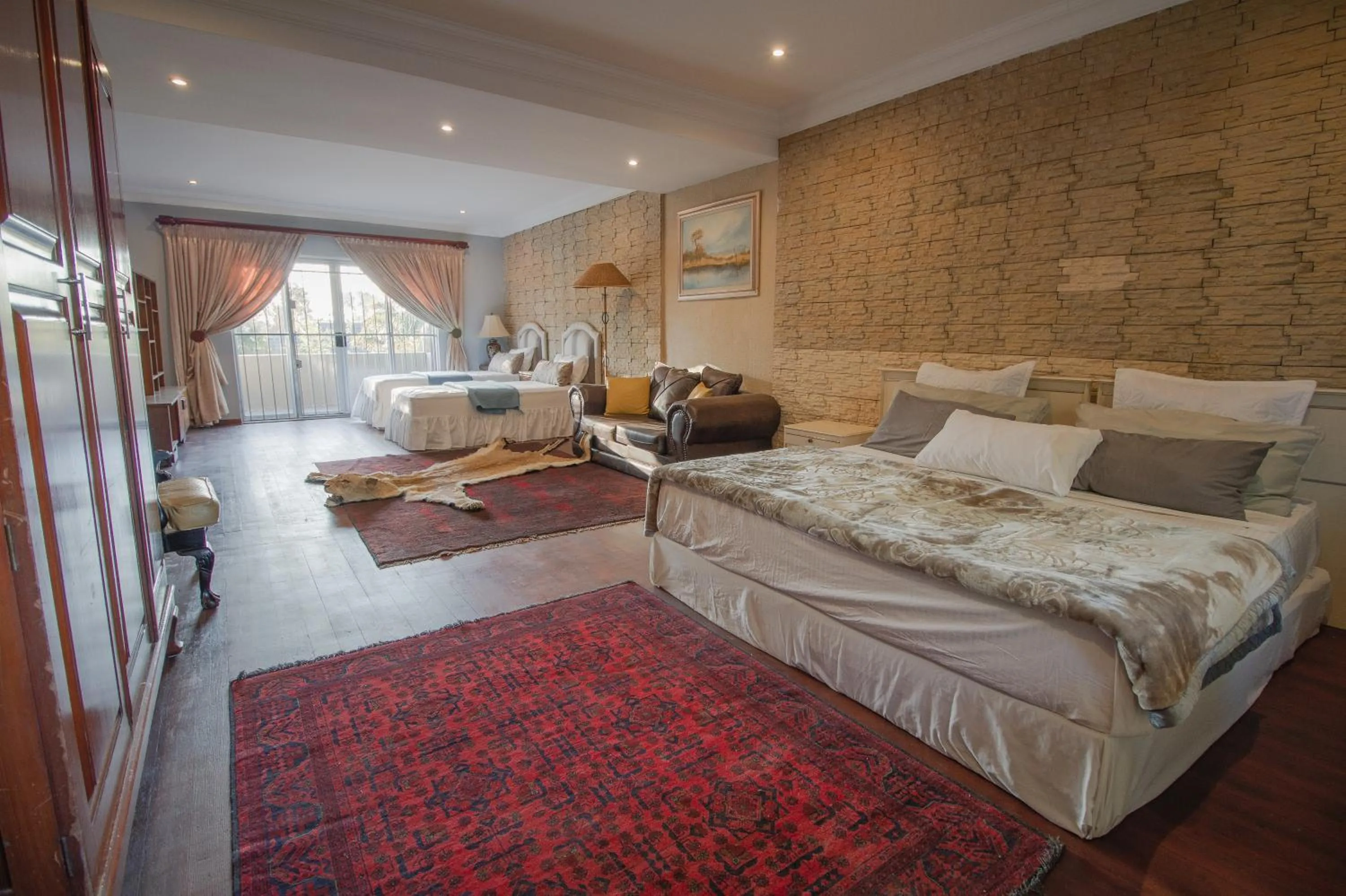 Photo of the whole room, Bed in The Afropolitan