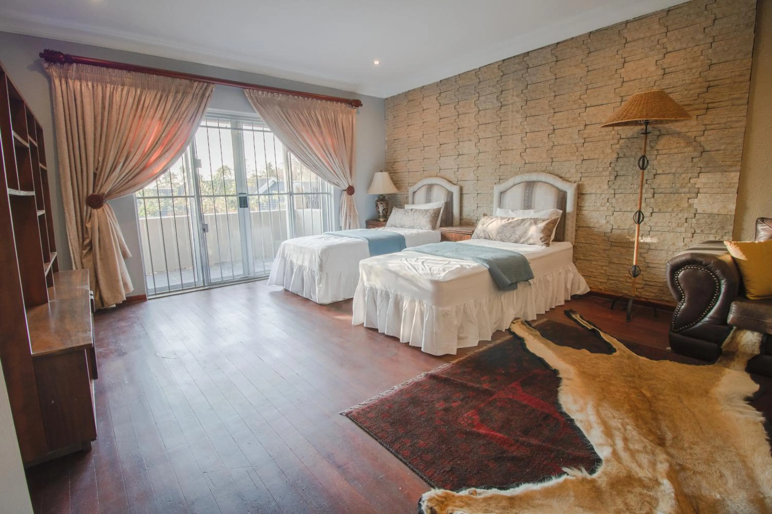 Photo of the whole room, Bed in The Afropolitan