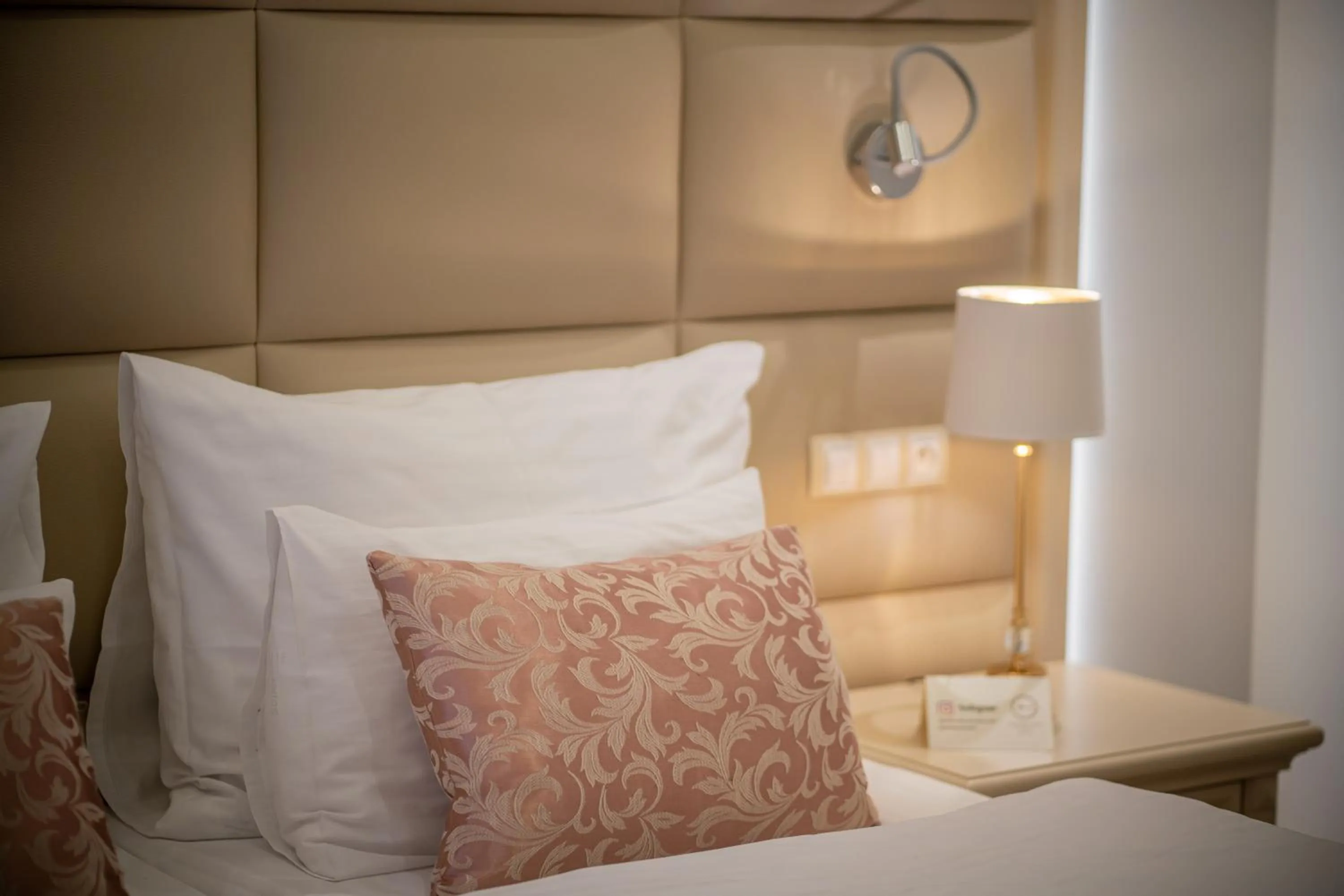 Bed in Golden Key Boutique Hotel