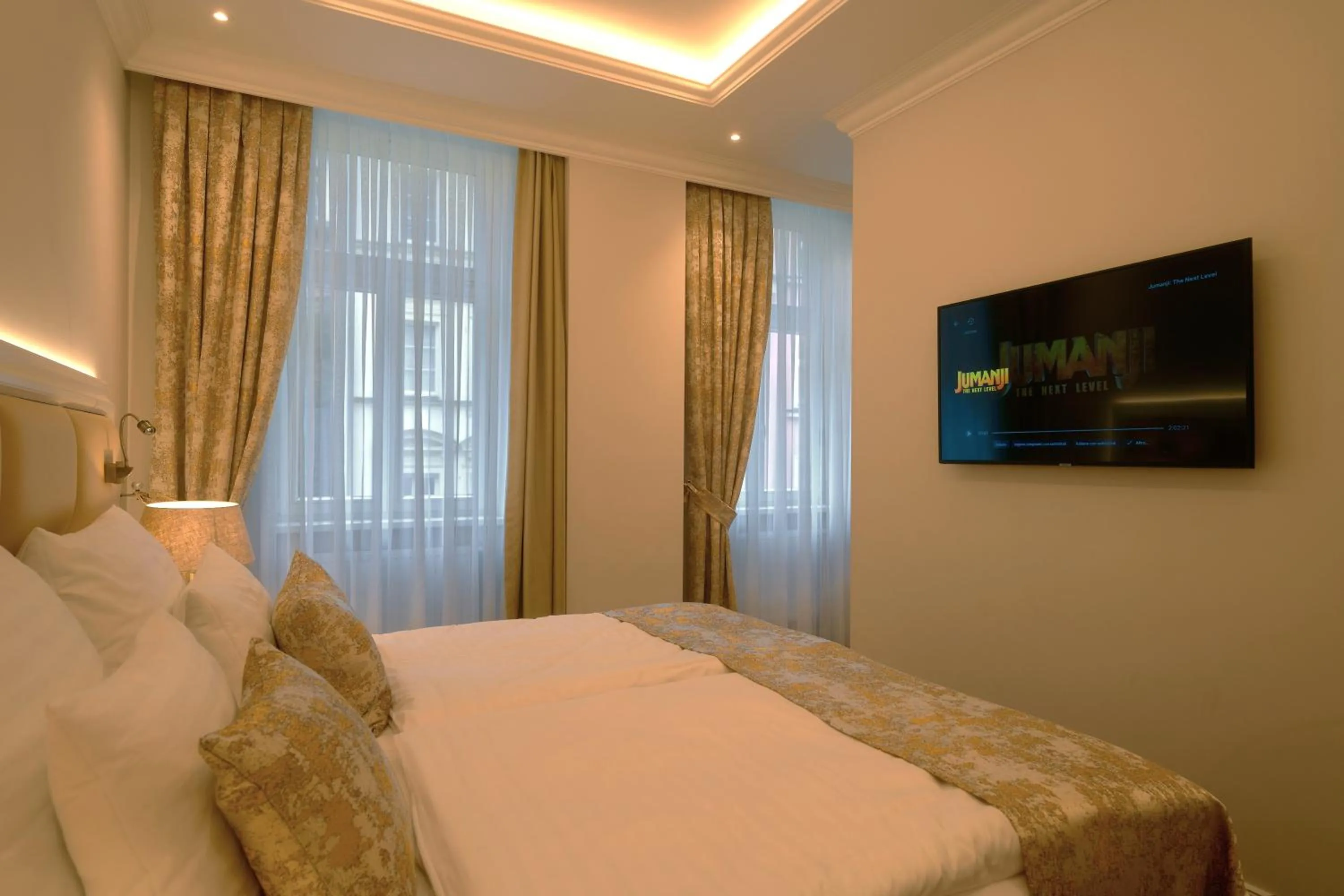 Bed in Golden Key Boutique Hotel