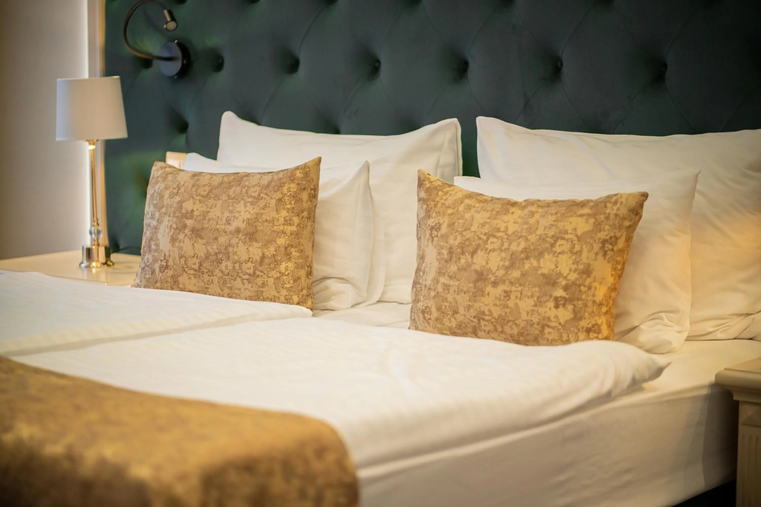 Bed in Golden Key Boutique Hotel